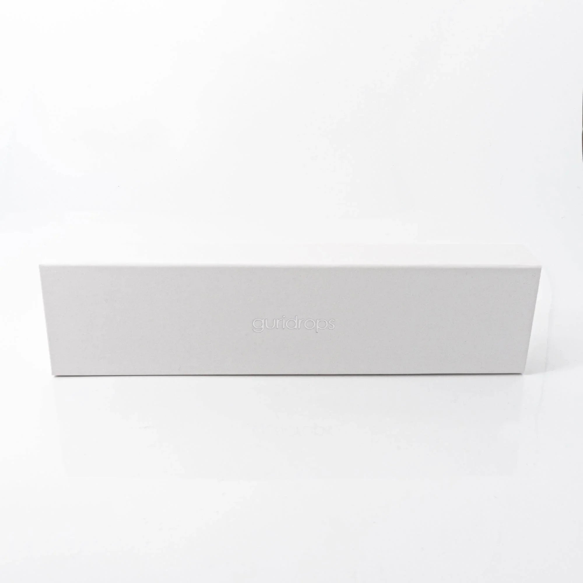 Wagashi Monaka glass dip pen in white gift box nestled in foam insert with traditional packaging visible