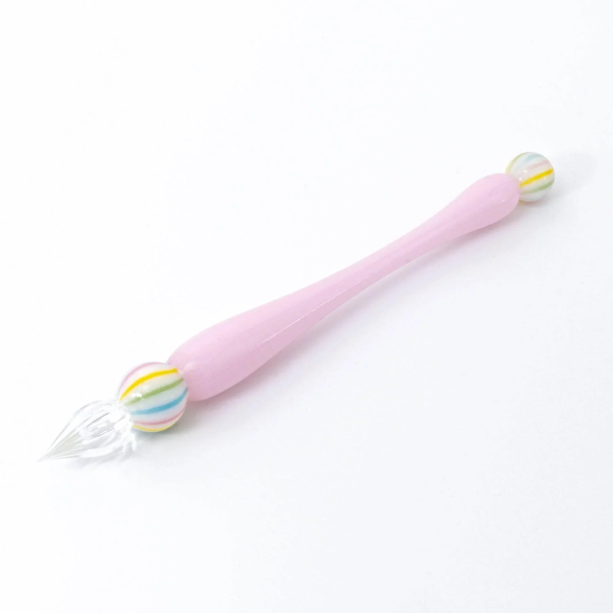 Wagashi Sakura Mochi glass dip pen with pale pink shaft, rainbow decorative bead, and coral glass top detail