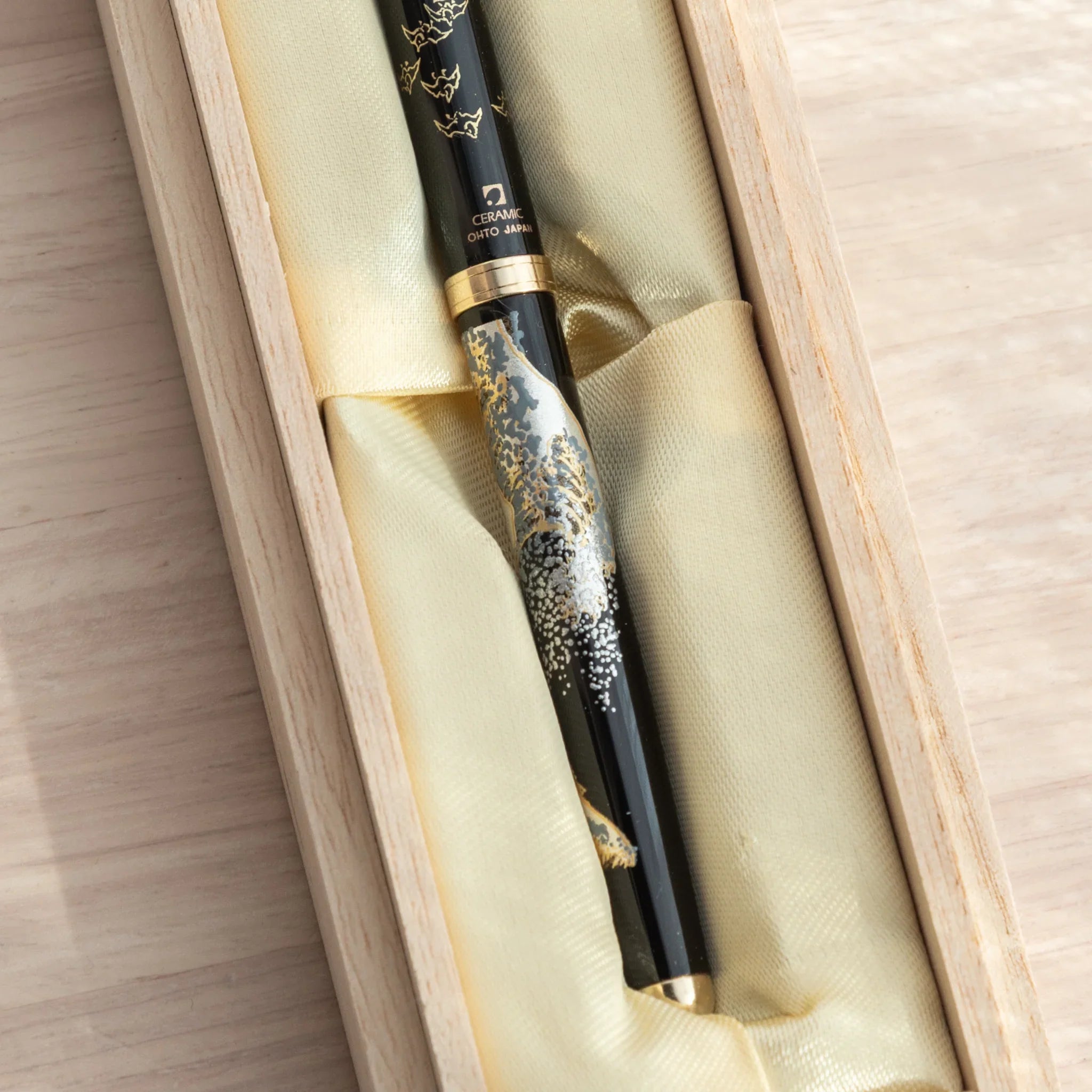 Maeju Yamanaka ballpoint pen with Great Wave silkscreen nestled in natural wood gift box with cream fabric lining