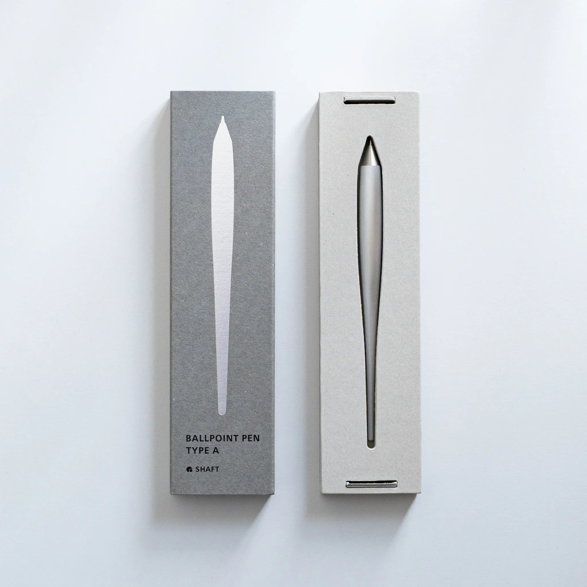 Two rectangular gray and white cardboard packaging boxes for Ballpoint Pen Type A showing pen outline window