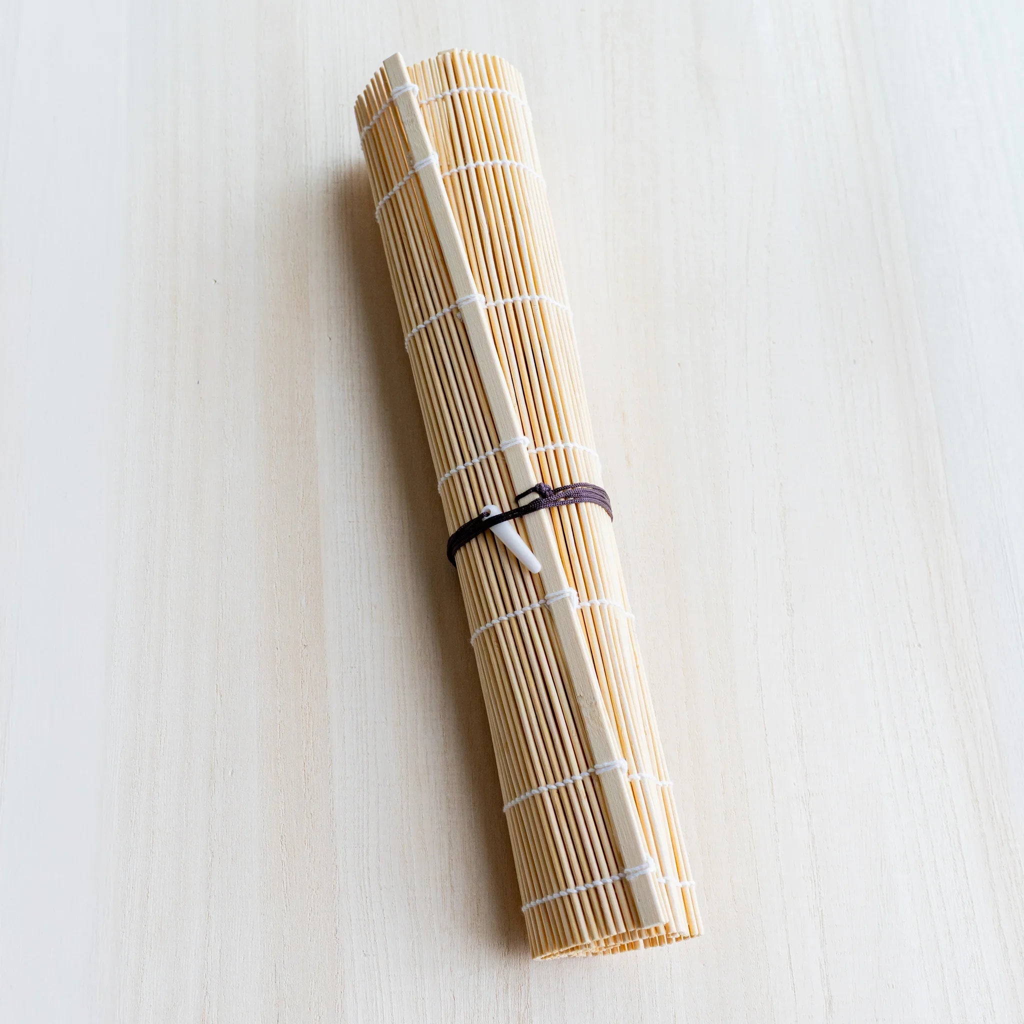 Akashiya bamboo brush roll close-up of the woven structure between bamboo rods