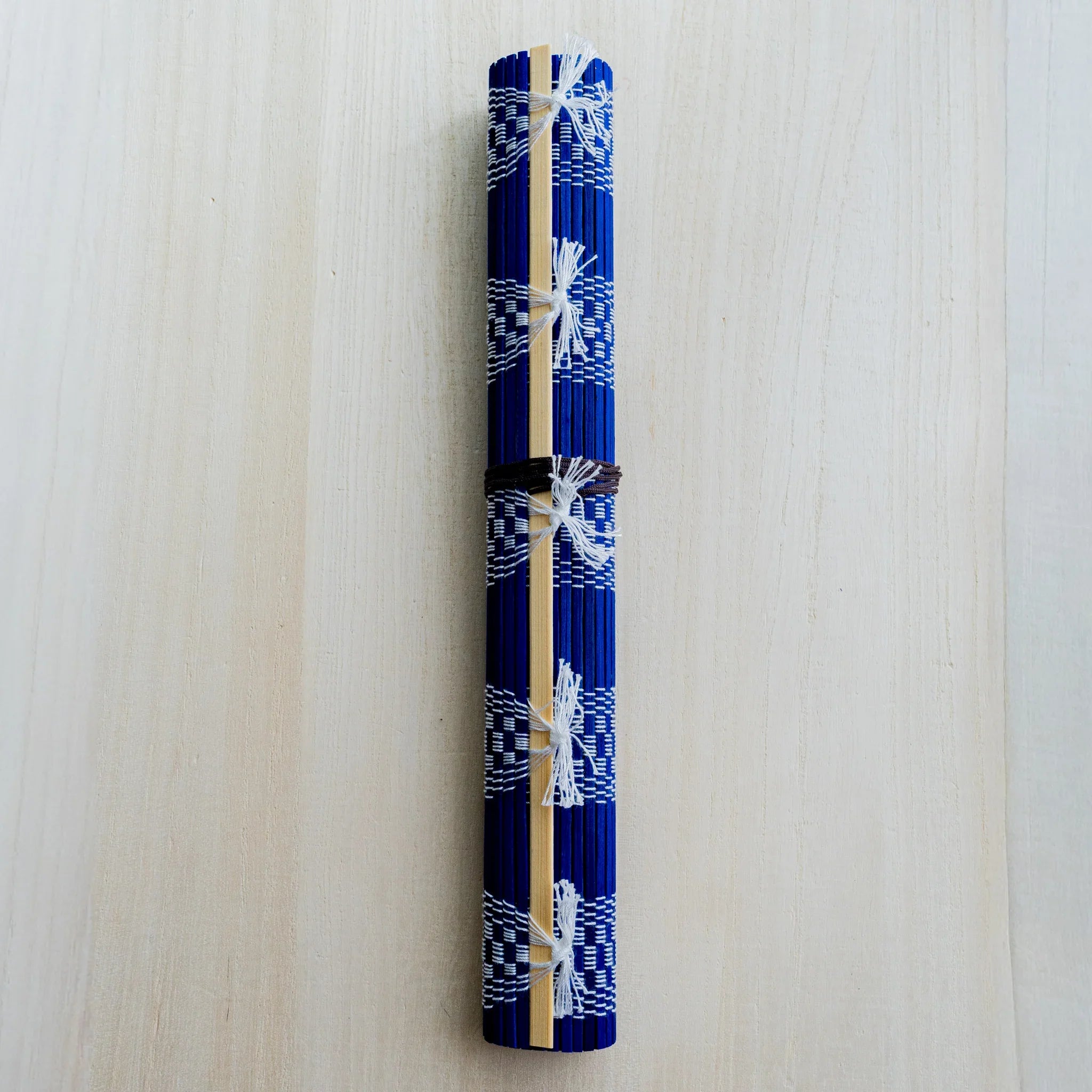 Akashiya bamboo brush roll, blue variant with white checkered weave pattern