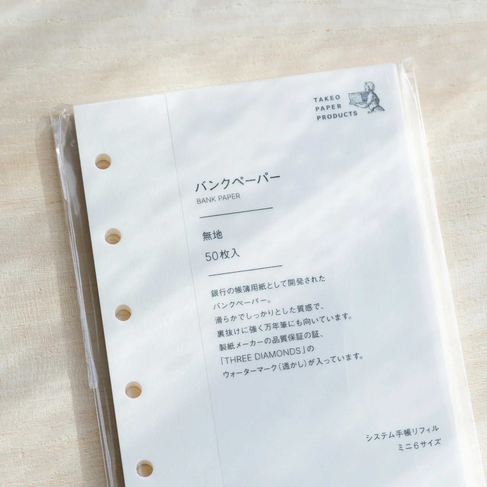 Japanese Stationery refill pack for mini 6 planners featuring bank paper sheets and six‑hole punches.