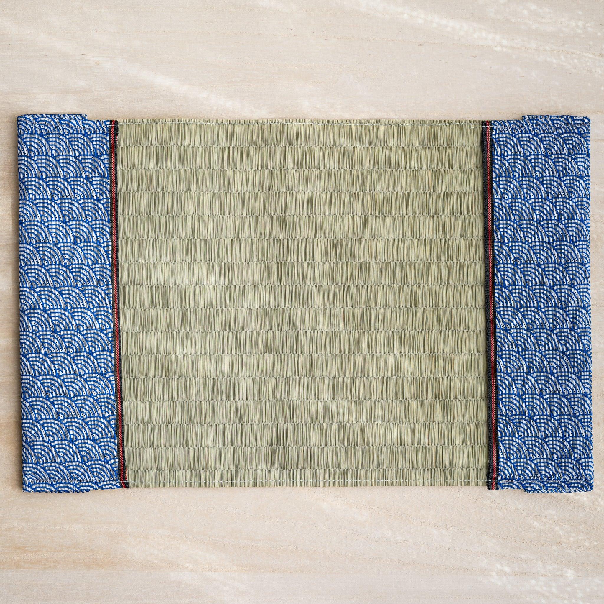 Blue Yachiyo tatami book cover unfolded flat, inner side up, rush straw center with wave flaps and red striped trim