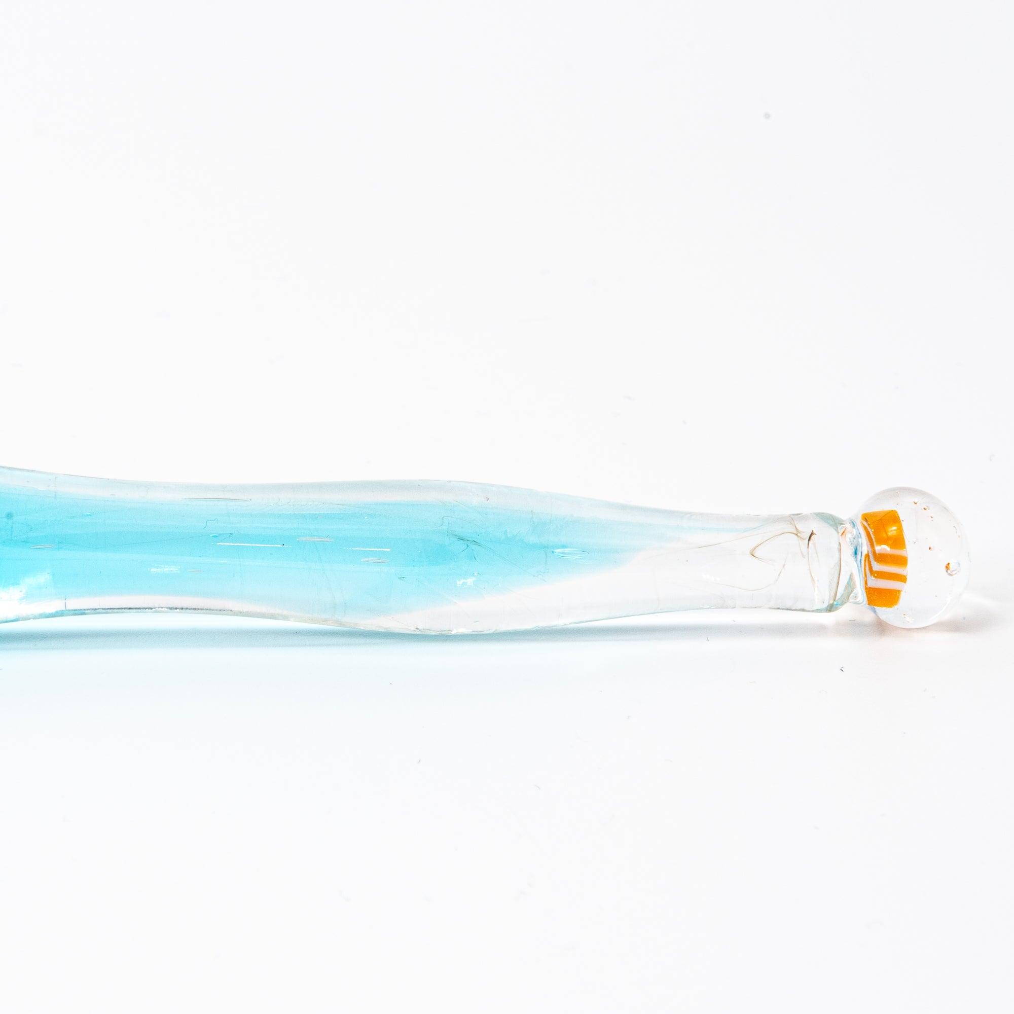 Close-up of glass pen with clownfish and coral motif, resembling a miniature aquarium. Ideal for Japanese stationery fans.