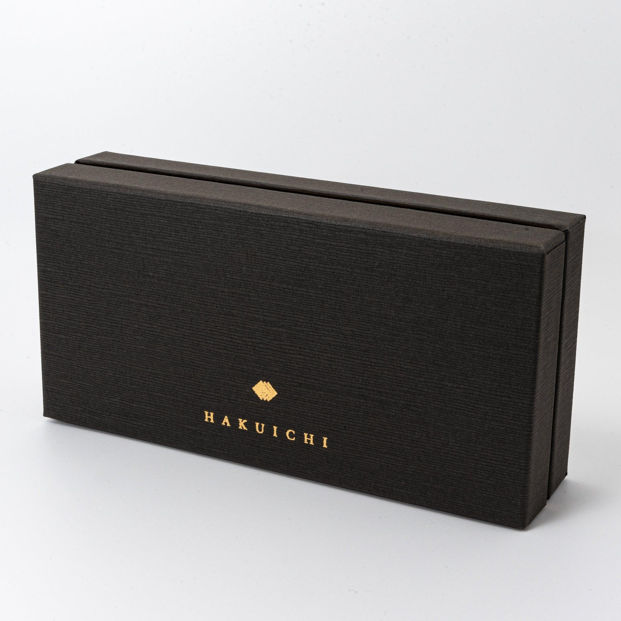 Angled view of the black gift box, highlighting the gold "HAKUICHI" logo and elegant textured finish.