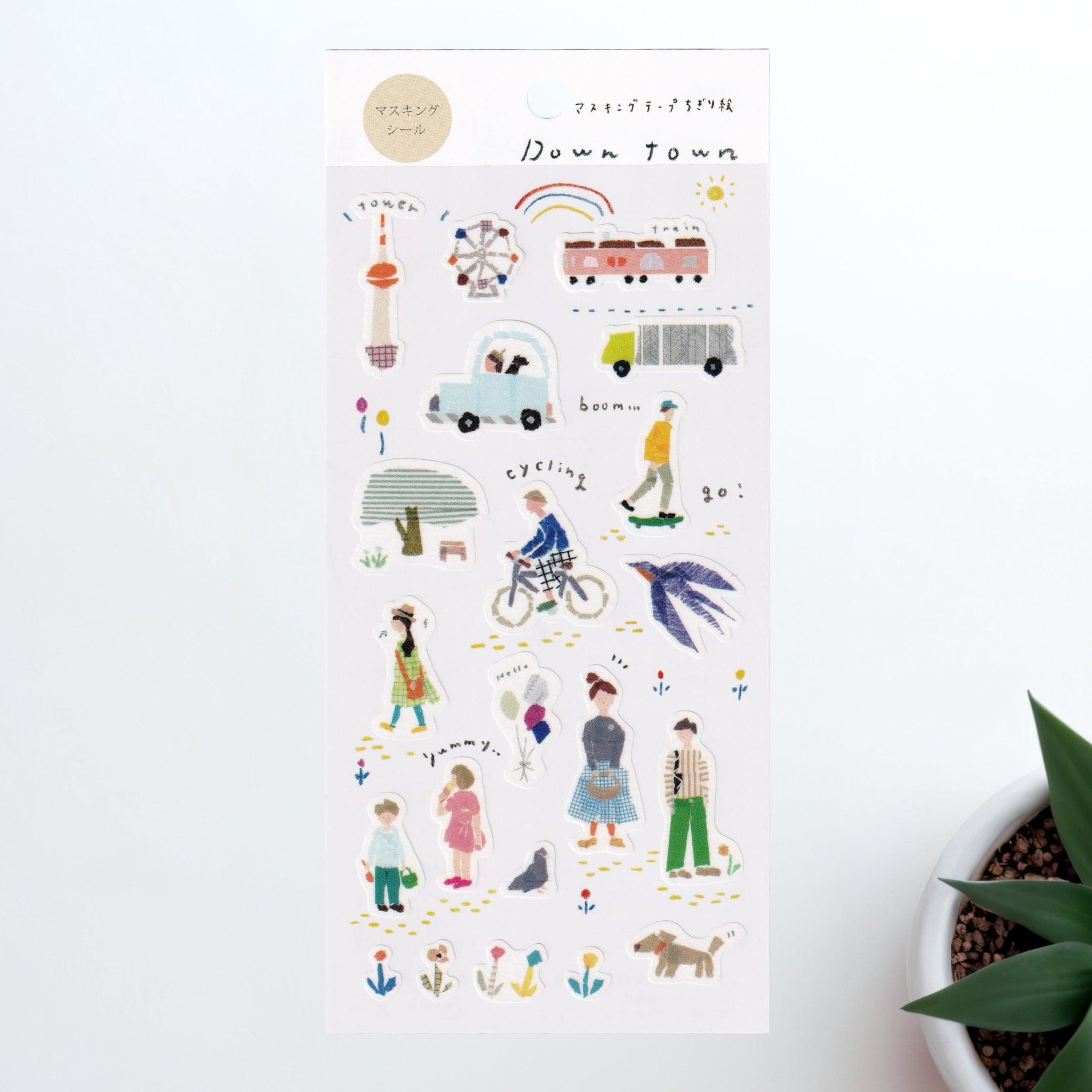 A Japanese stationery washi sticker sheet featuring charming downtown scenes, including people walking, cycling, buses, trains, and birds, in a soft watercolor style.