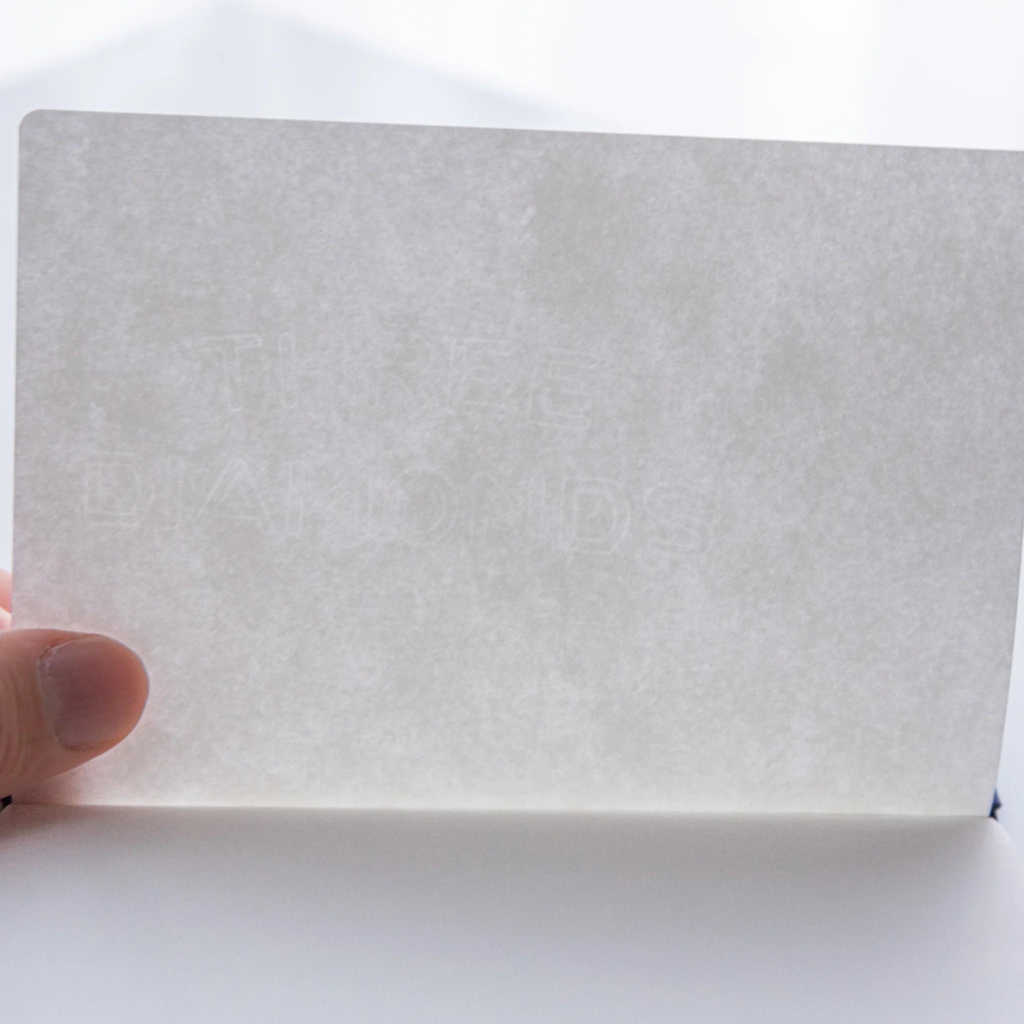Translucent paper of Dressco Bank Ledger Paper Japanese Notebook showing “THREE DIAMONDS” watermark.