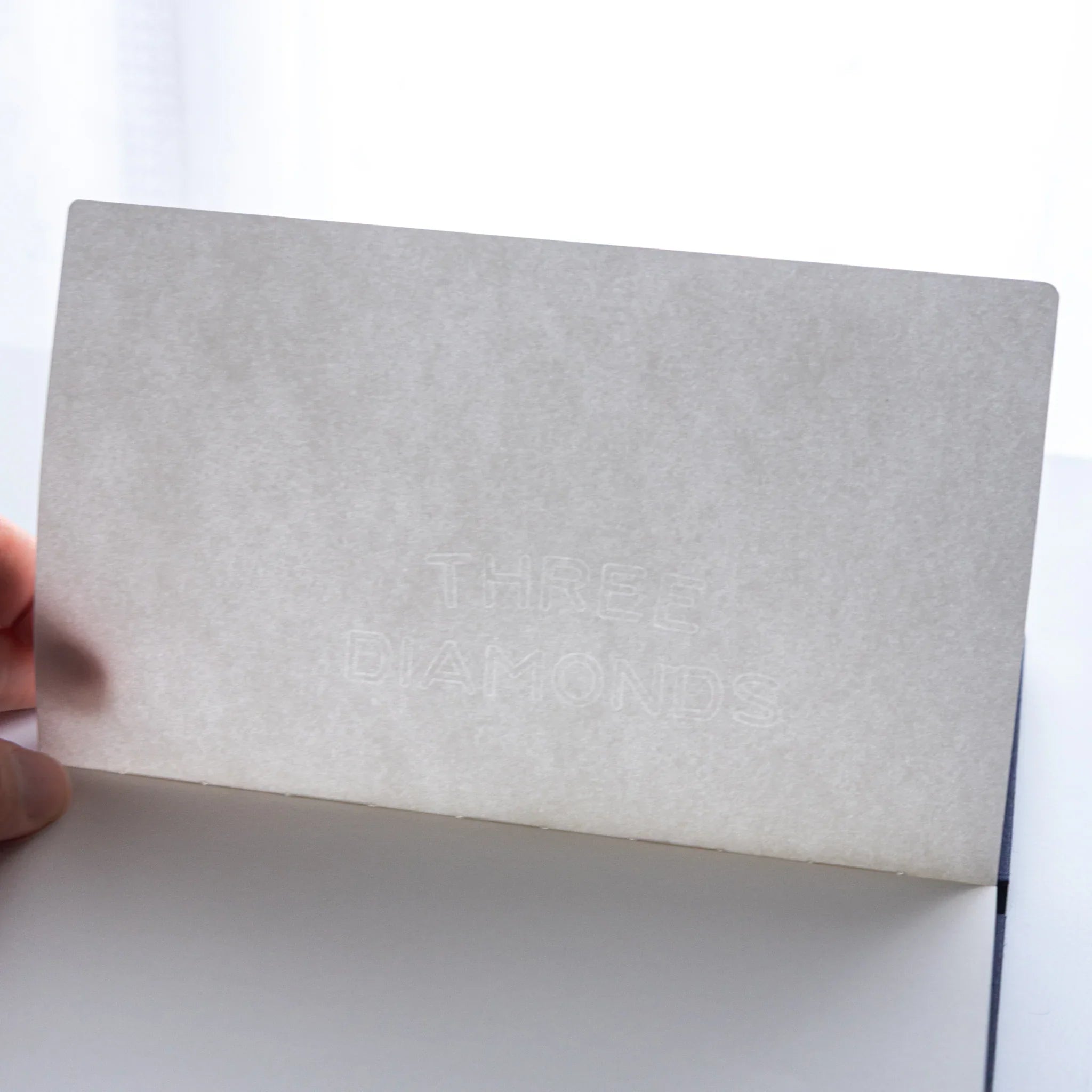 “THREE DIAMONDS” watermark visible on Dressco Bank Ledger Paper Japanese Notebook page.