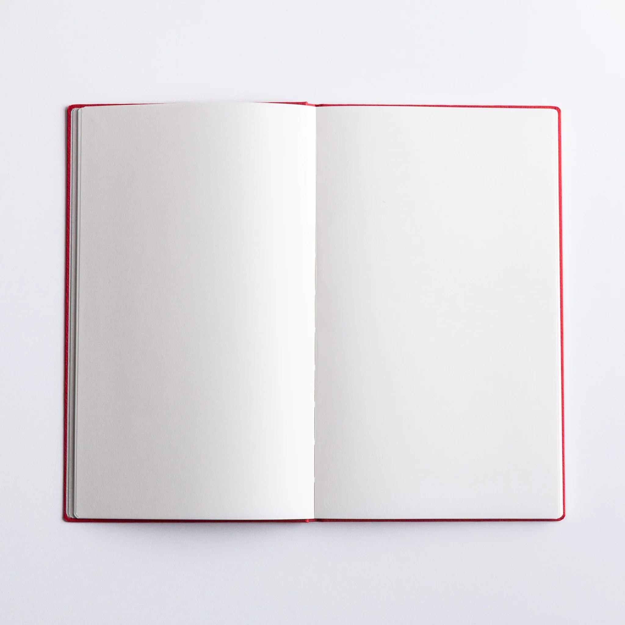 Open Dressco Bank Ledger Paper Japanese Notebook in red with blank pages.