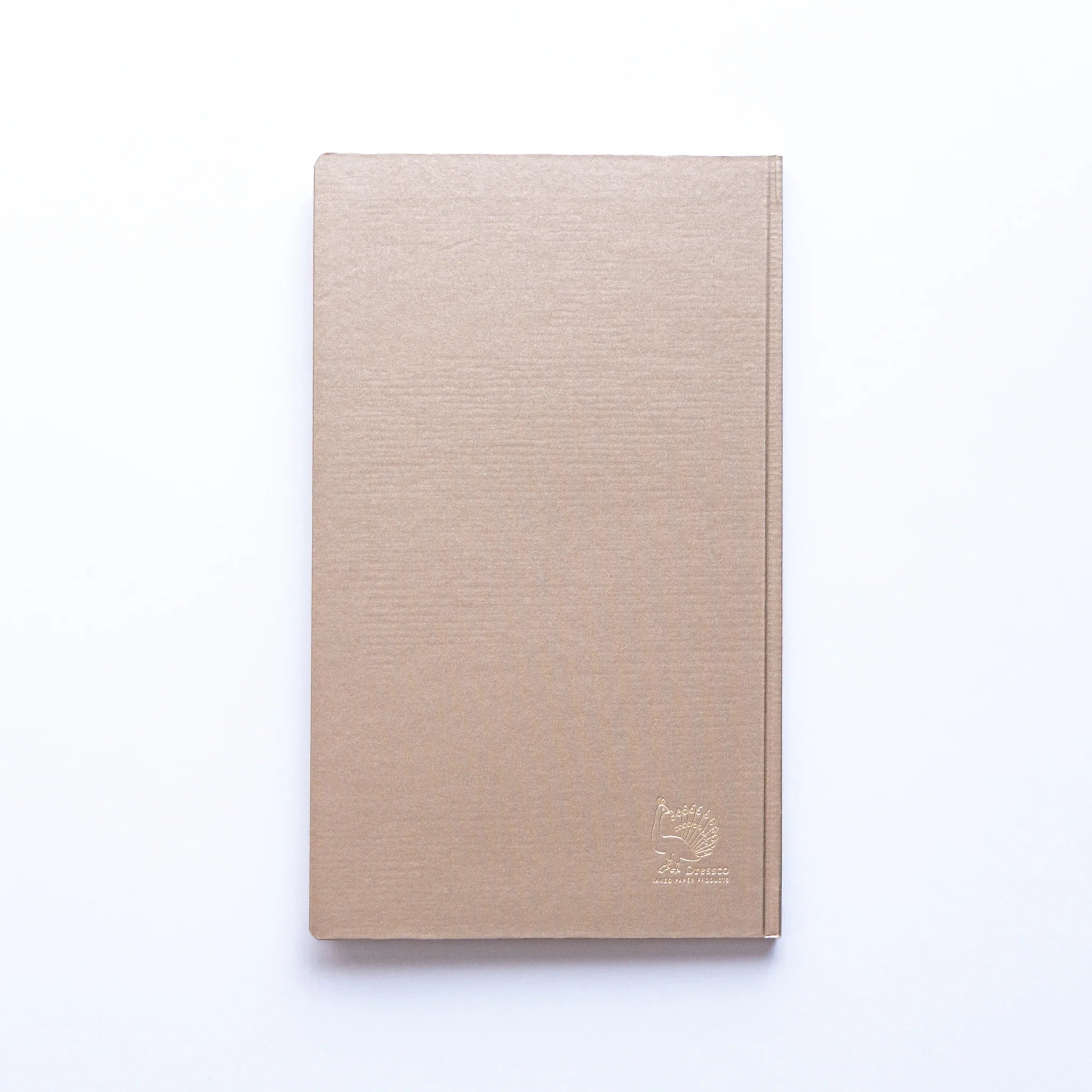 Gold Dressco peacock logo embossed on Champagne Gold cover of Japanese Notebook.
