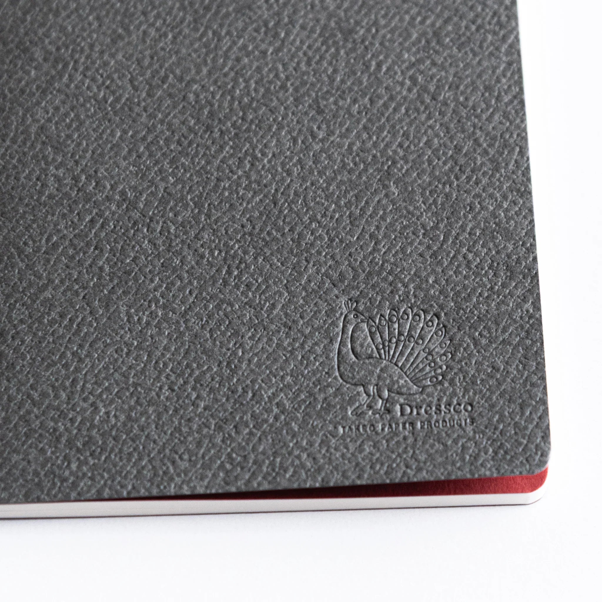Dressco Bank Ledger Paper Stitched Japanese Notebook, Grey, with embossed peacock logo detail.