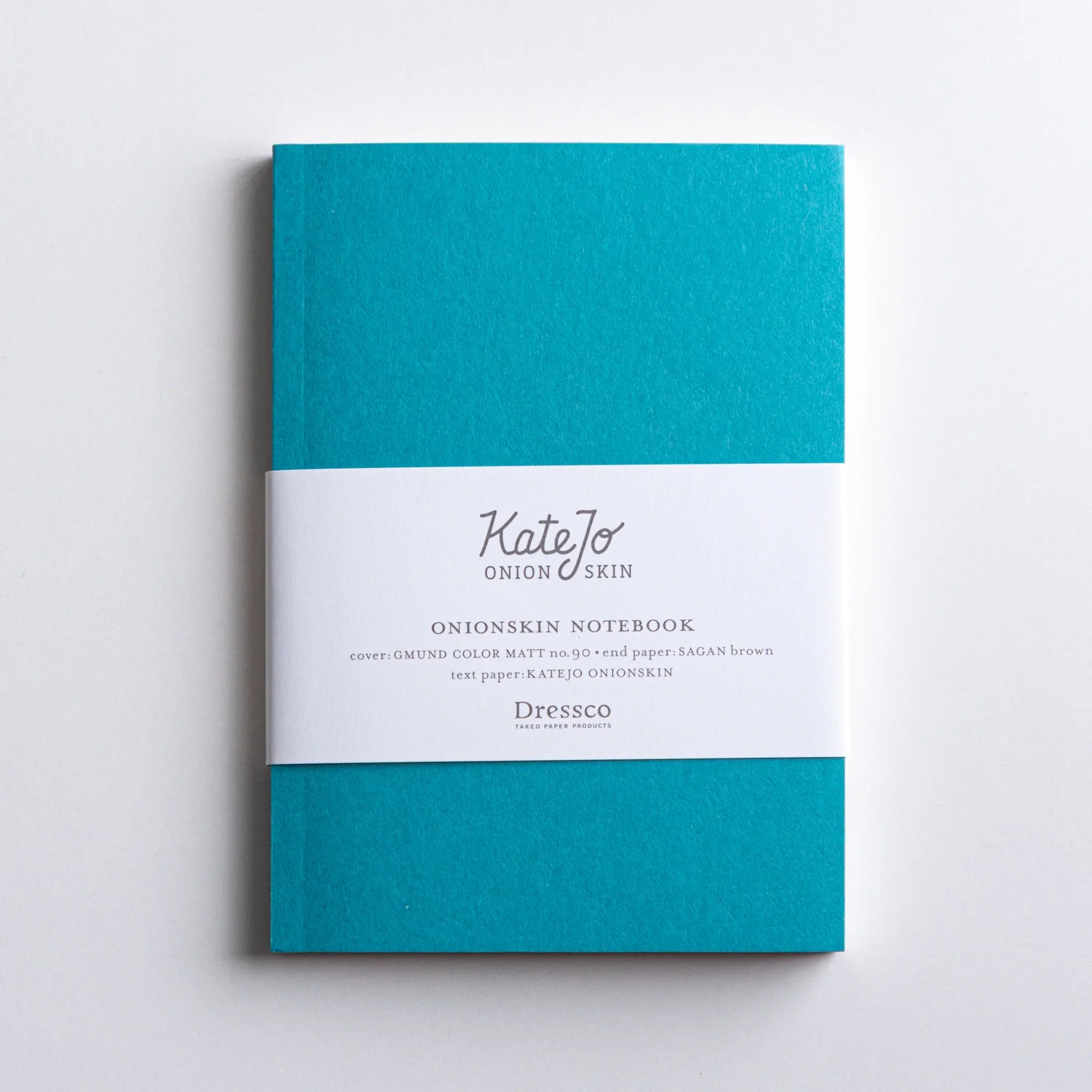 Dressco Teal Blue Onion Skin Japanese Notebook A6 with clean white band and minimal typography.