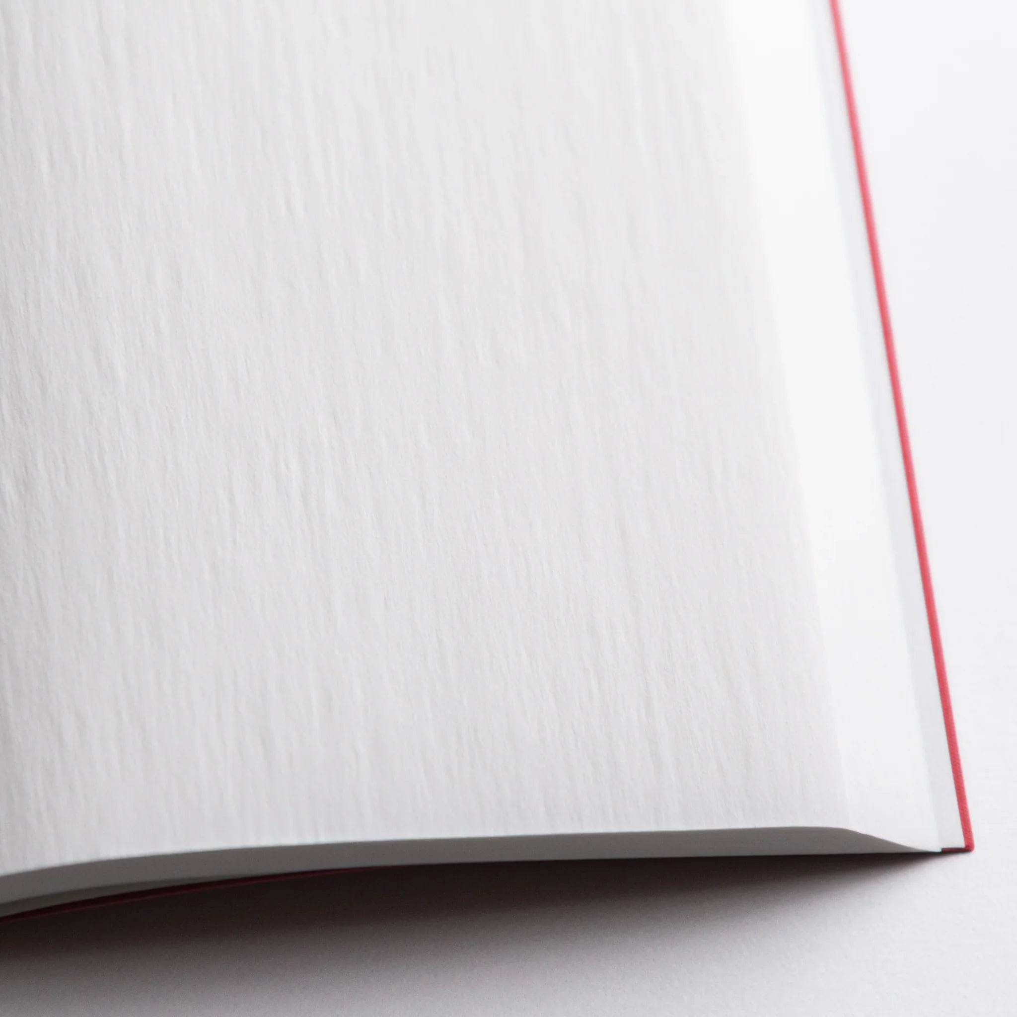 Close-up of crisp onion-skin texture in Dressco Pink Onion Skin Japanese Notebook A6 pages.