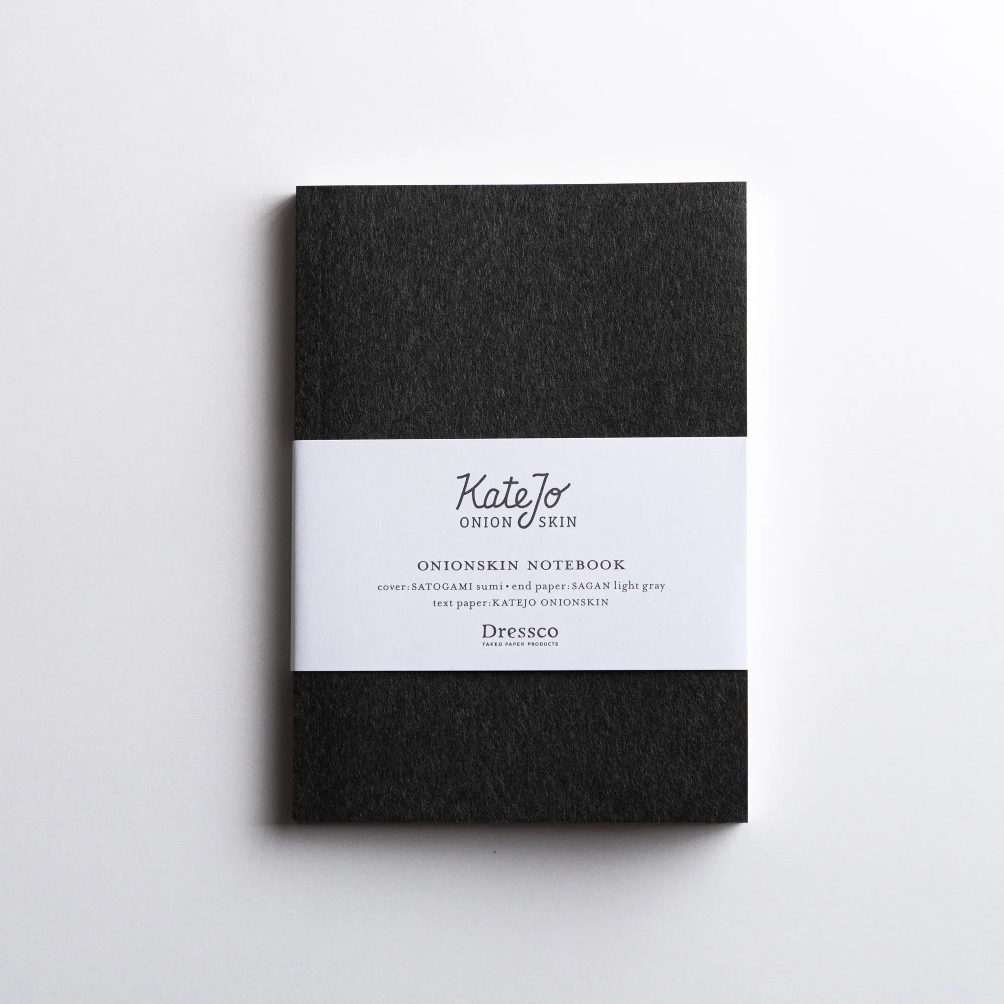Dressco Black Onion Skin Japanese Notebook A6 with minimalist white band and  Black cover.