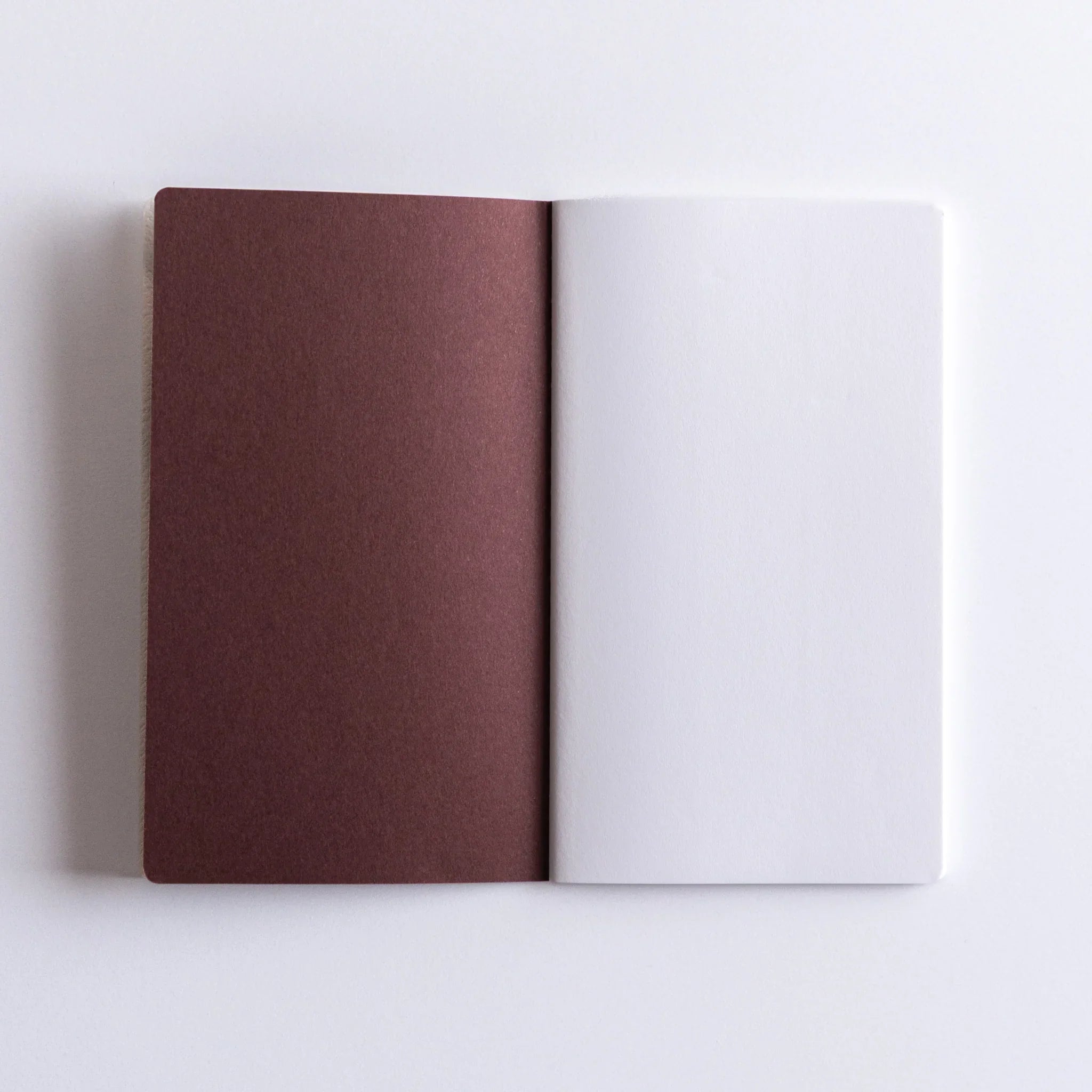 Open Dressco Spica Laid Bond Japanese Notebook showing inner page layout.