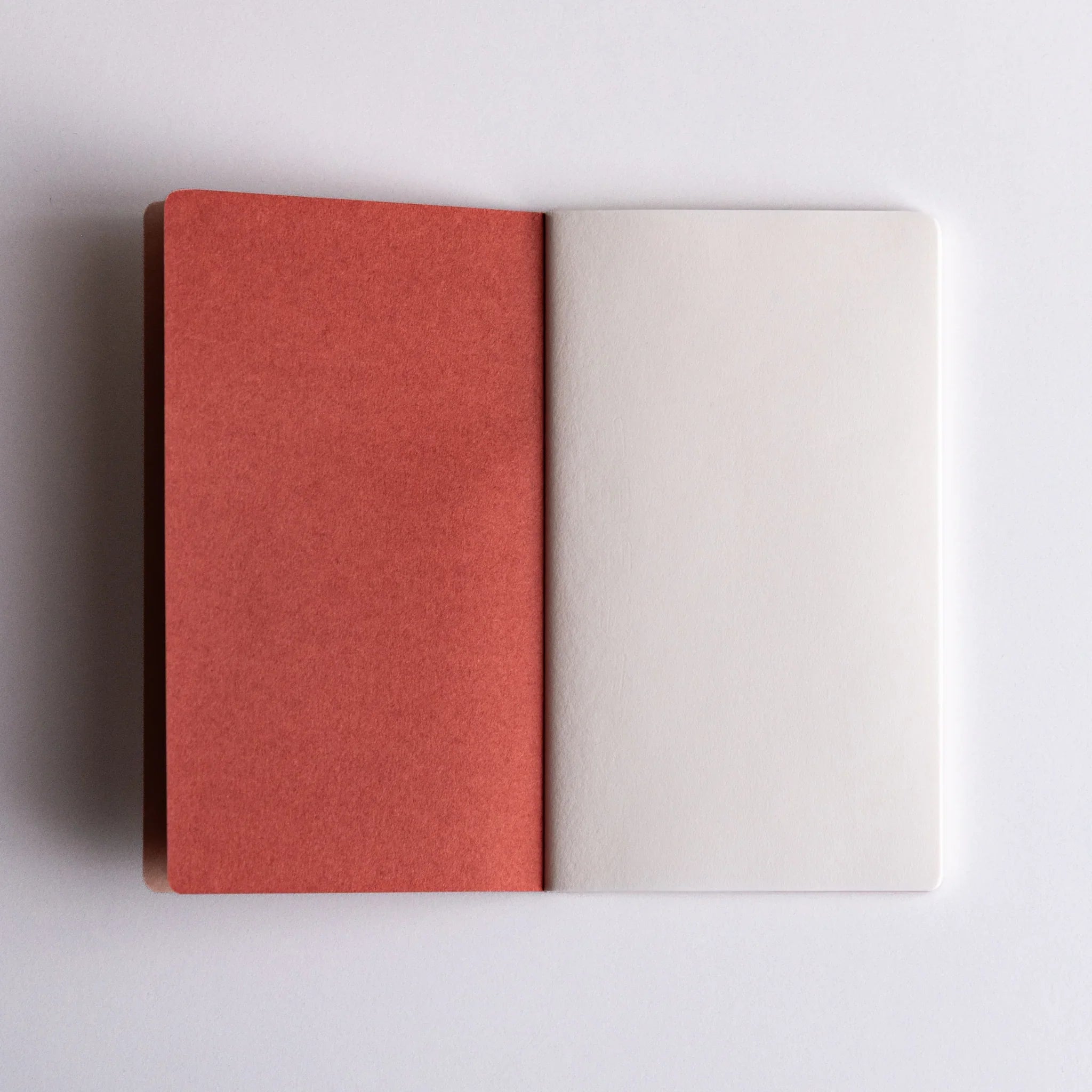 Open Japanese notebook with brown and white covers made from Bank Ledger Paper.
