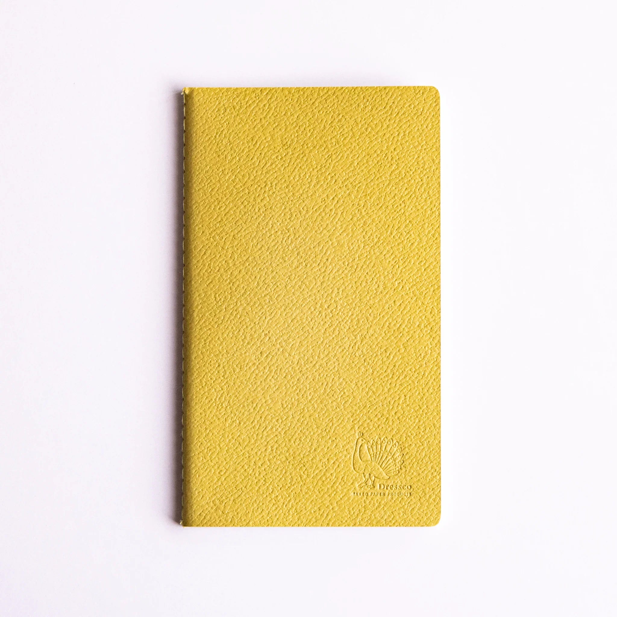 Spica Laid Bond Paper Japanese notebook in avocado hue with stitched spine, showcasing textured cover and minimalist elegance.