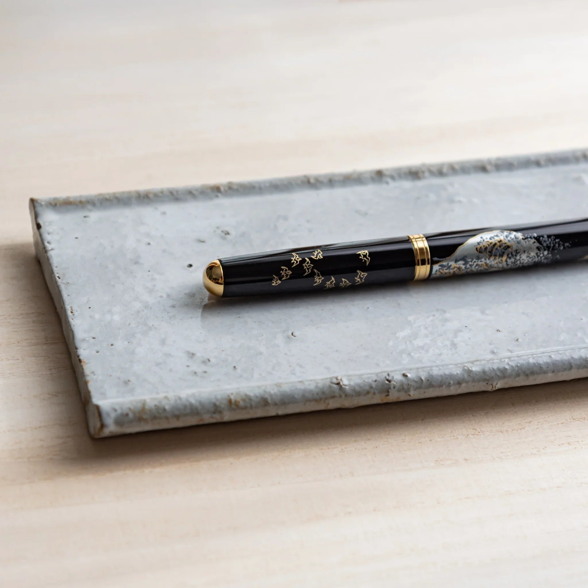 Japanese Pen Tray Desk Accessory, white glaze ceramic tray with fountain pen placed on the desk.