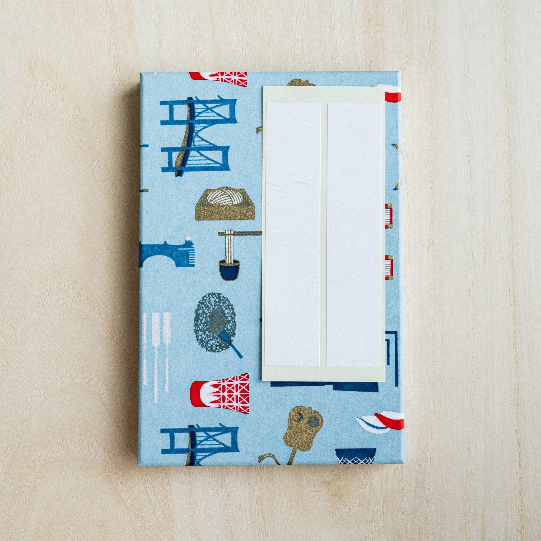 Edo Tokyo goshuincho stamp book light blue cover with two blank white paper title labels placed on it