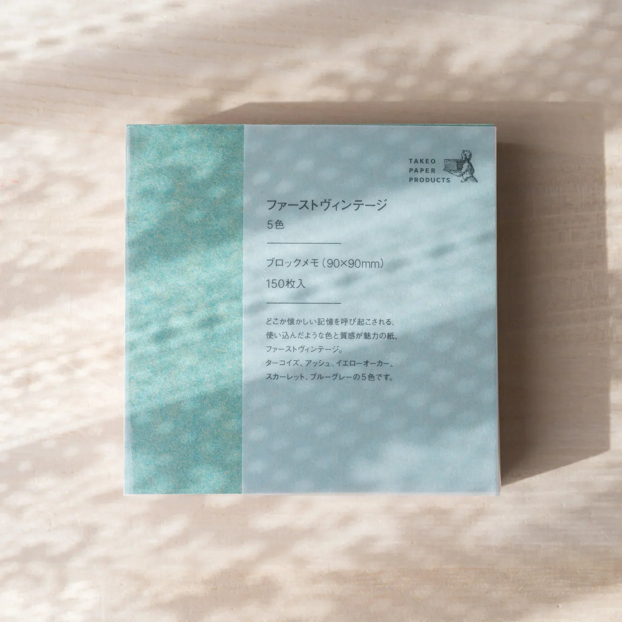 First Vintage memo pad with teal cover showing Takeo Paper Products logo and product details in Japanese