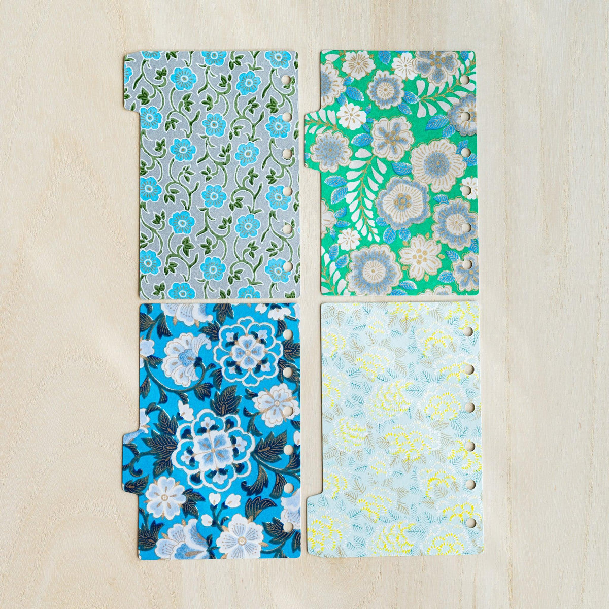 Reverse of the four Garden Mini 6 index dividers, punched holes on the right and side tabs on the left
