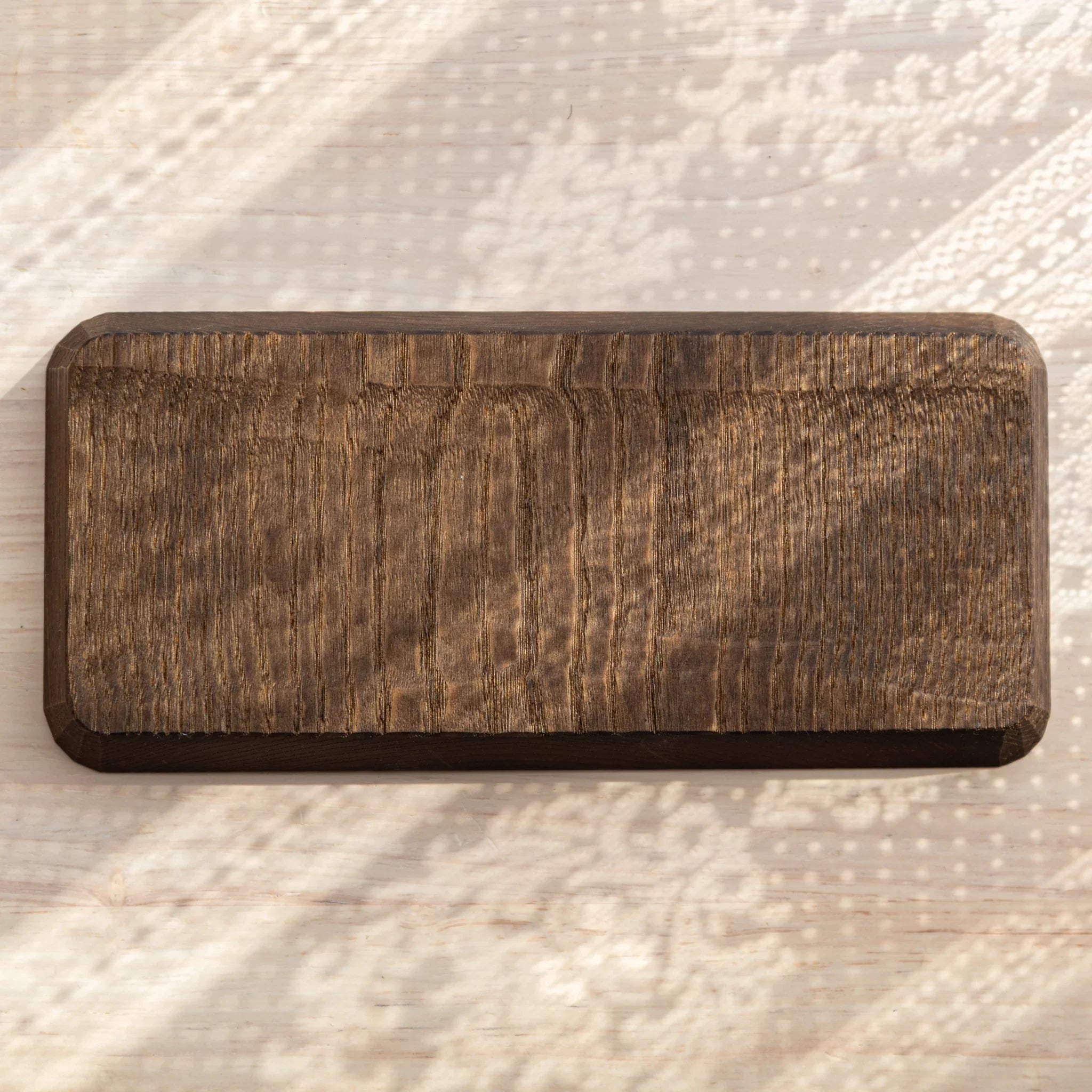 Bottom view of Hand-Carved Slim Wagatabon Japanese Pen Tray revealing natural wood grain texture.
