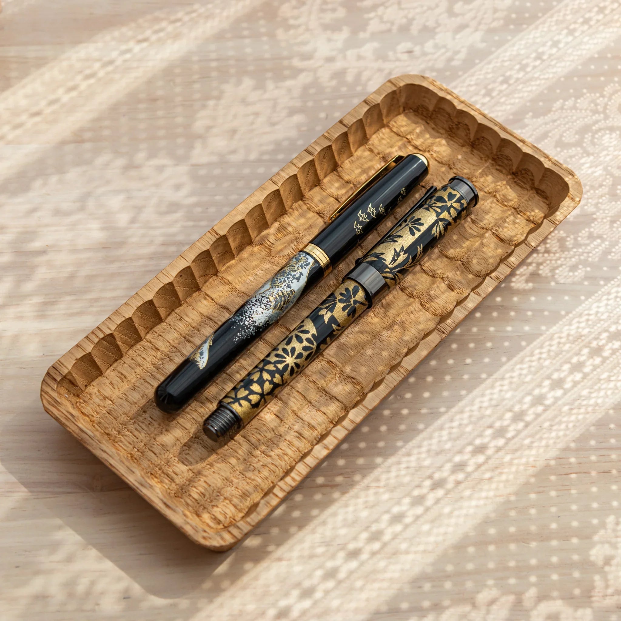 Hand-Carved Slim Wagatabon Pen Tray displaying two elegant Japanese Fountain Pens in a parallel layout.