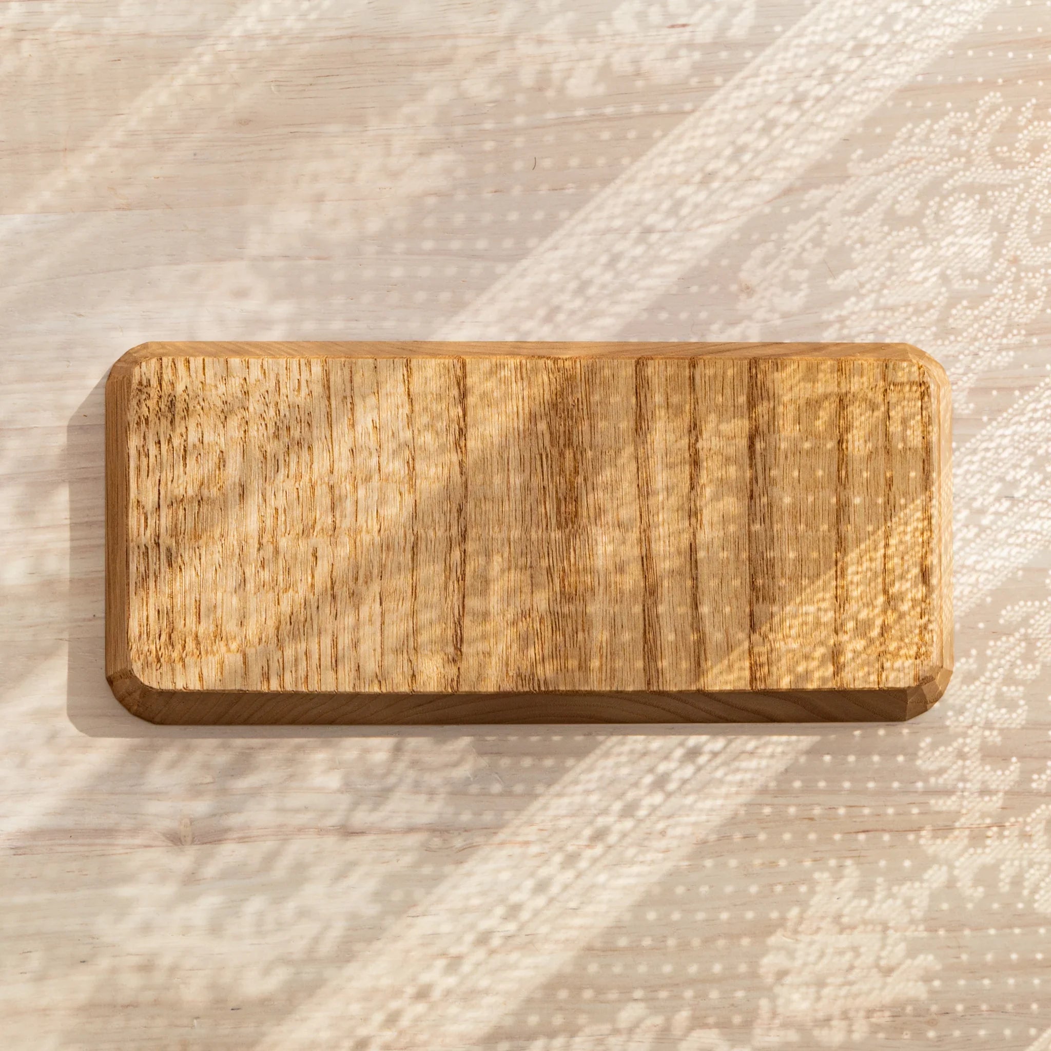 Bottom view of Hand-Carved Slim Wagatabon Japanese Pen Tray revealing natural wood grain texture.