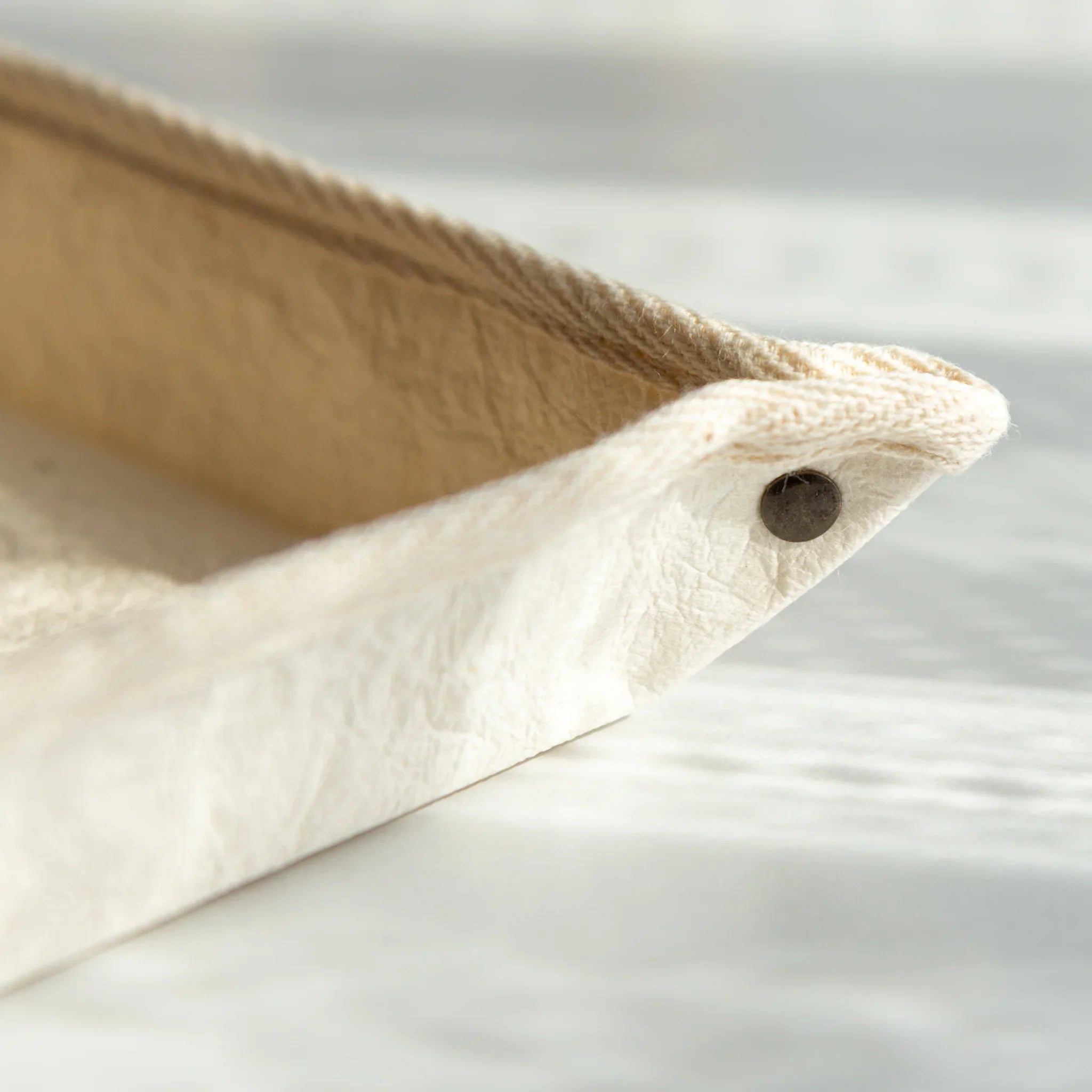 Corner detail of Japanese Pen Tray showing riveted edge and fine washi texture, a blend of durability and beauty.