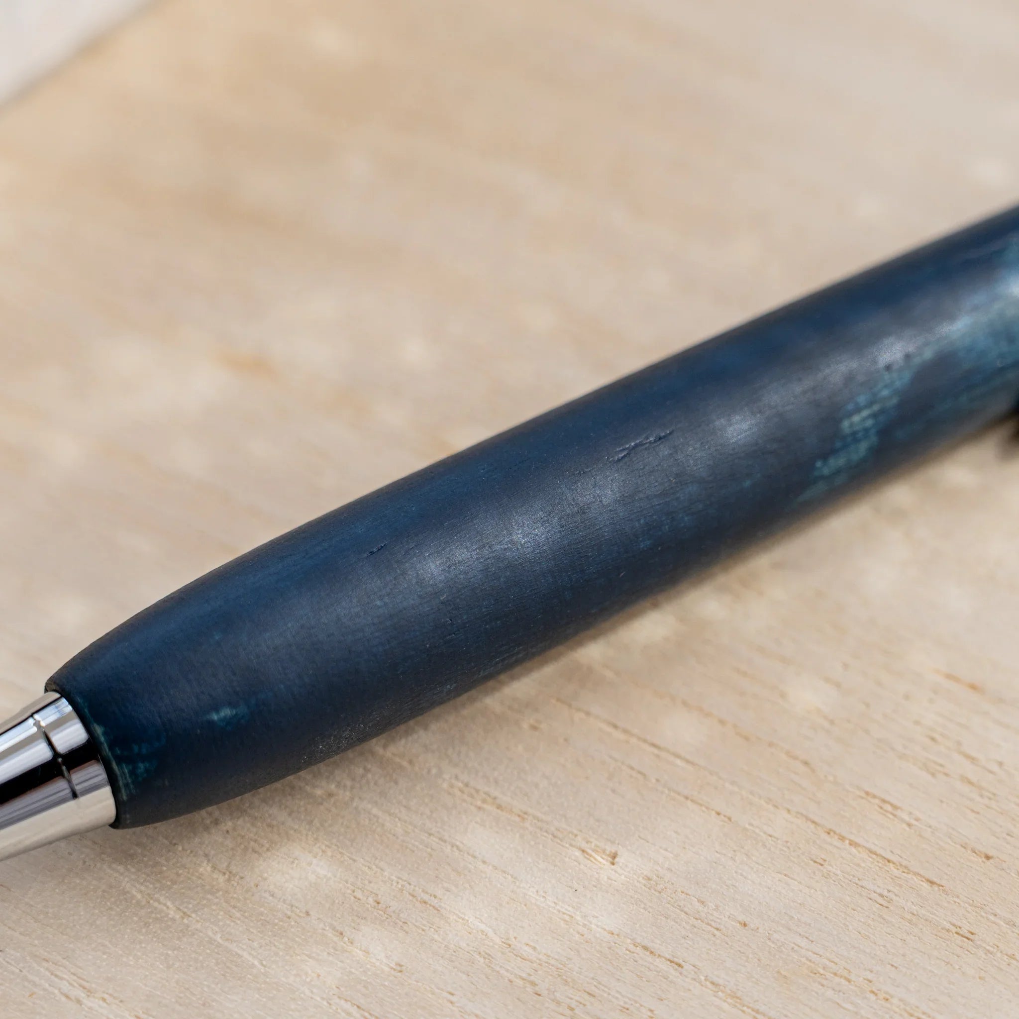 Horse chestnut wood urushi lacquered ballpoint pen in indigo blue on white, Japanese wood, silver knock and clip
