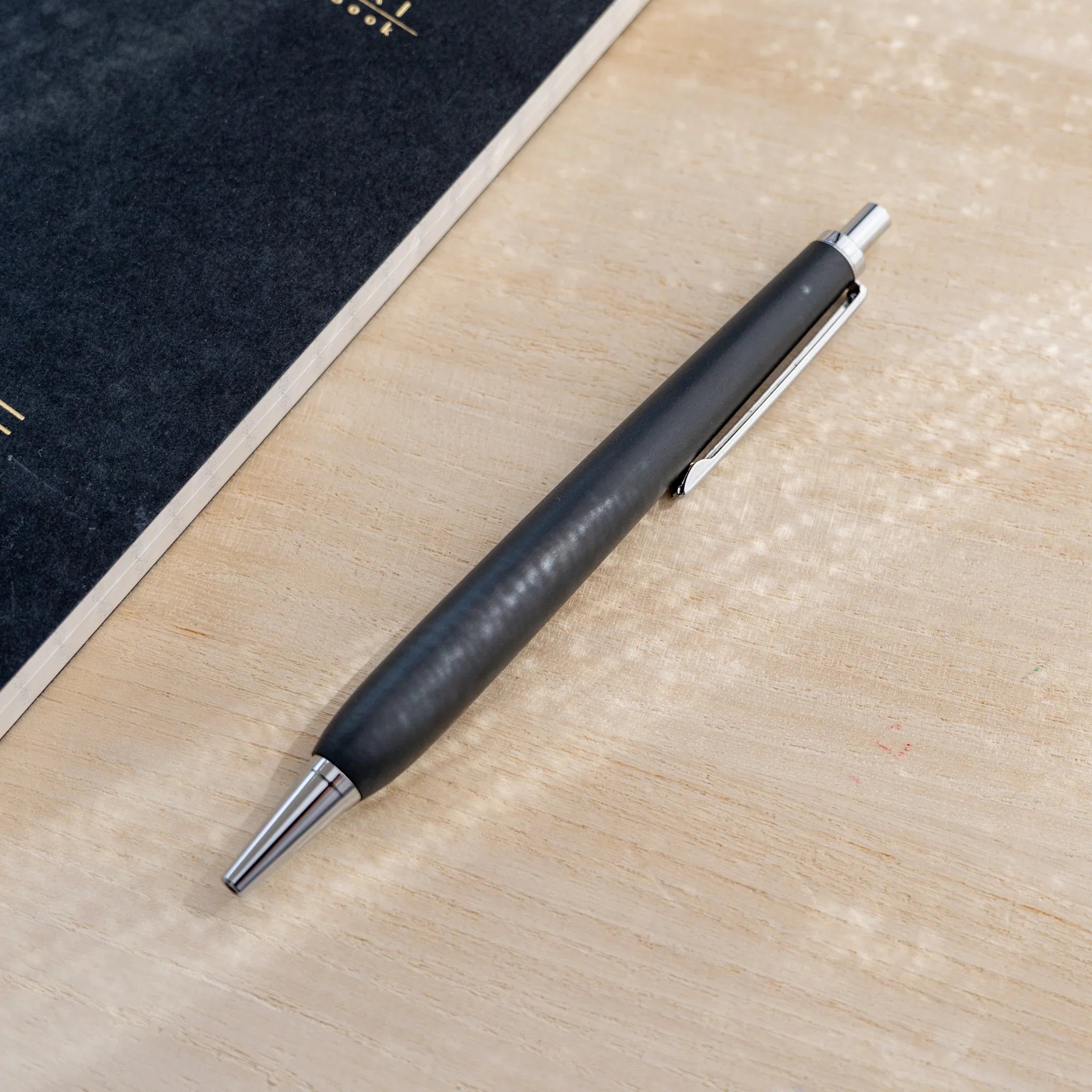 Horse chestnut wood urushi lacquered ballpoint pen in charcoal black, Japanese wood, silver knock and clip