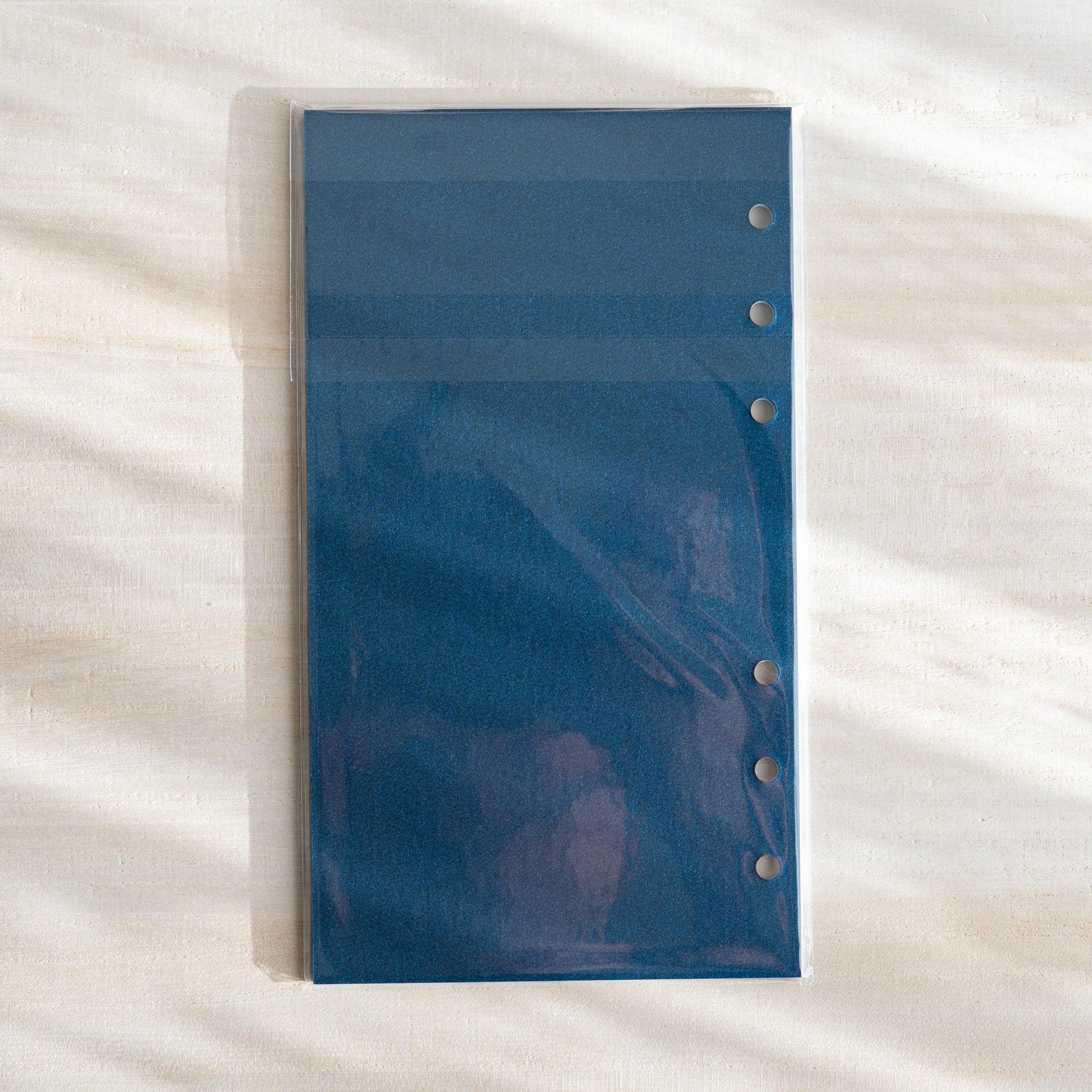 Japanese Stationery pale blue onion skin planner refill in clear packaging, shown flat with visible six-hole punches.