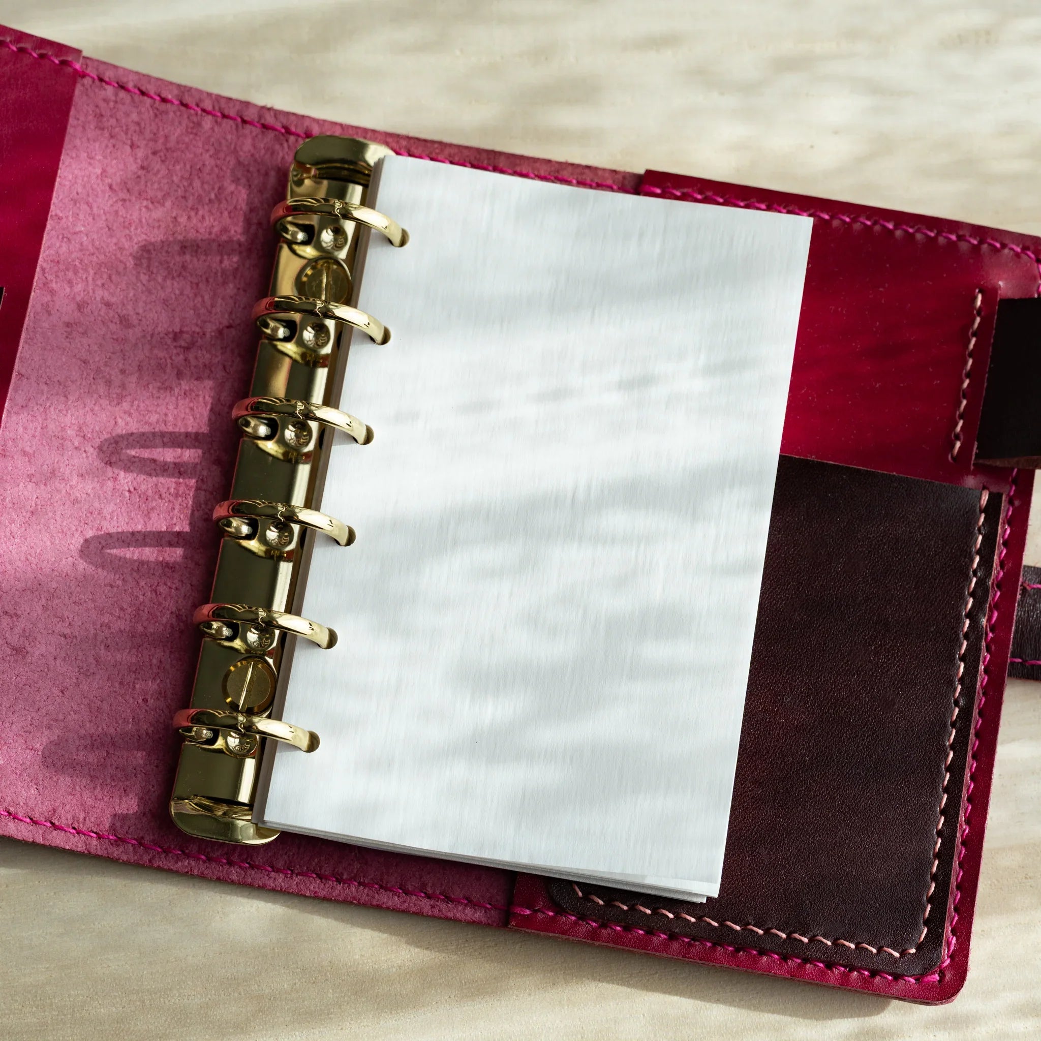 Japanese stationery Mini 6 ring planner refill with blank bank paper pages set in a leather binder with gold rings