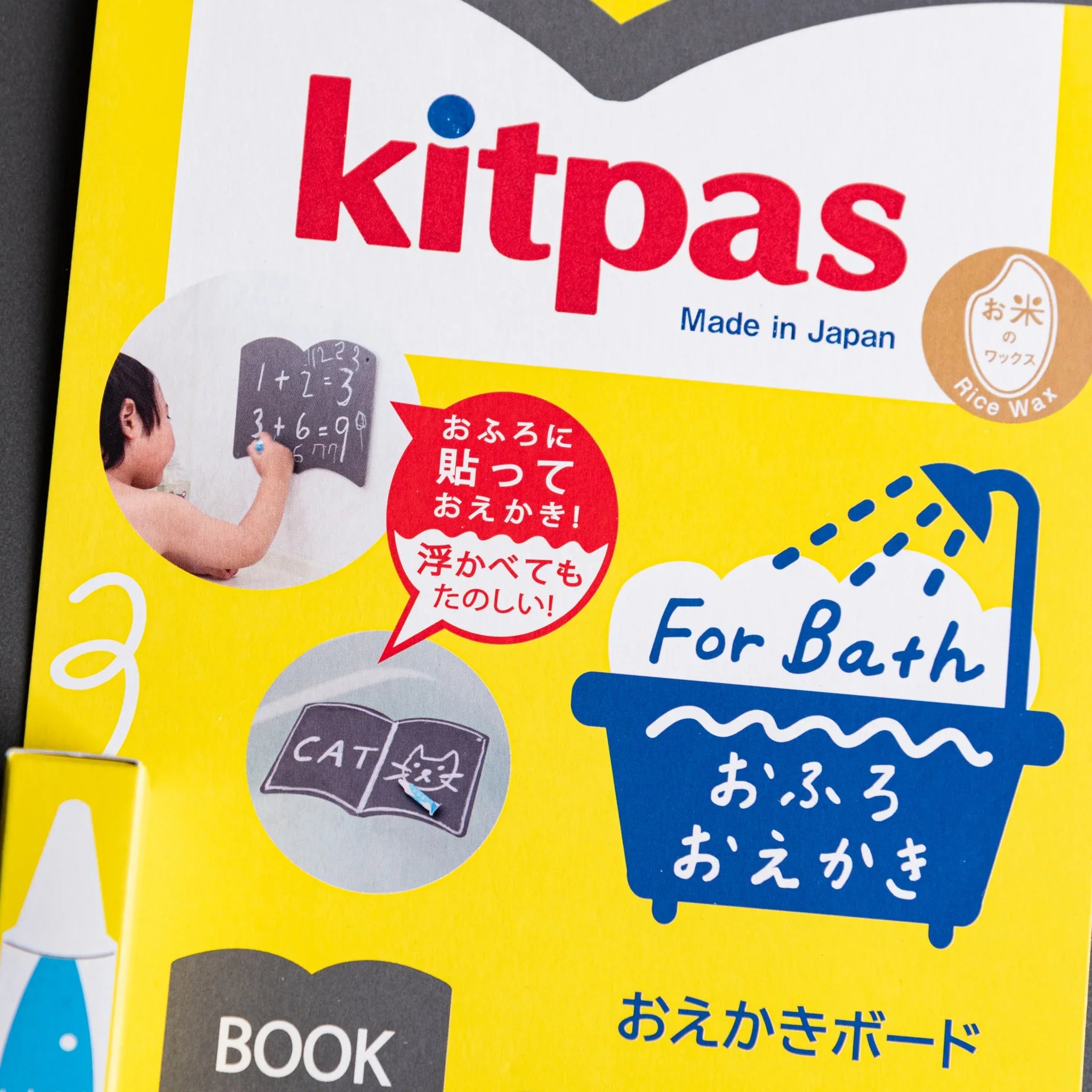 Side profile of drawing board revealing thickness, hinge mechanism, and curved wave-shaped edge and features