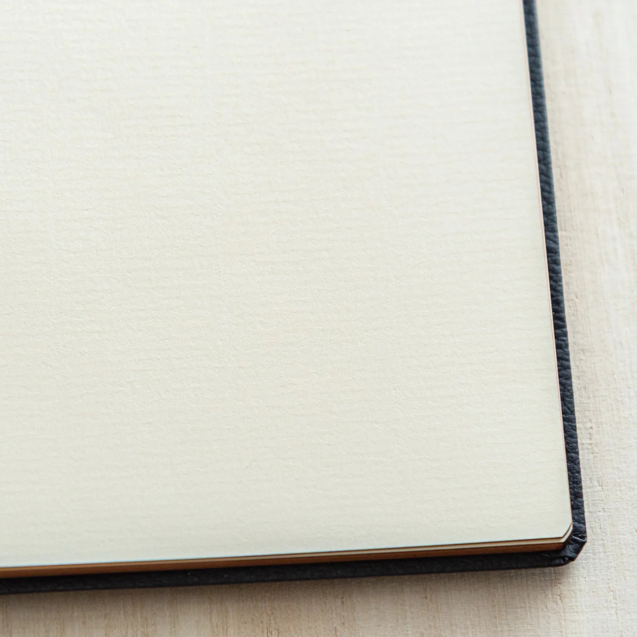 Close-up of smooth cream paper texture inside LIFE Japanese Schedule Book 2026.