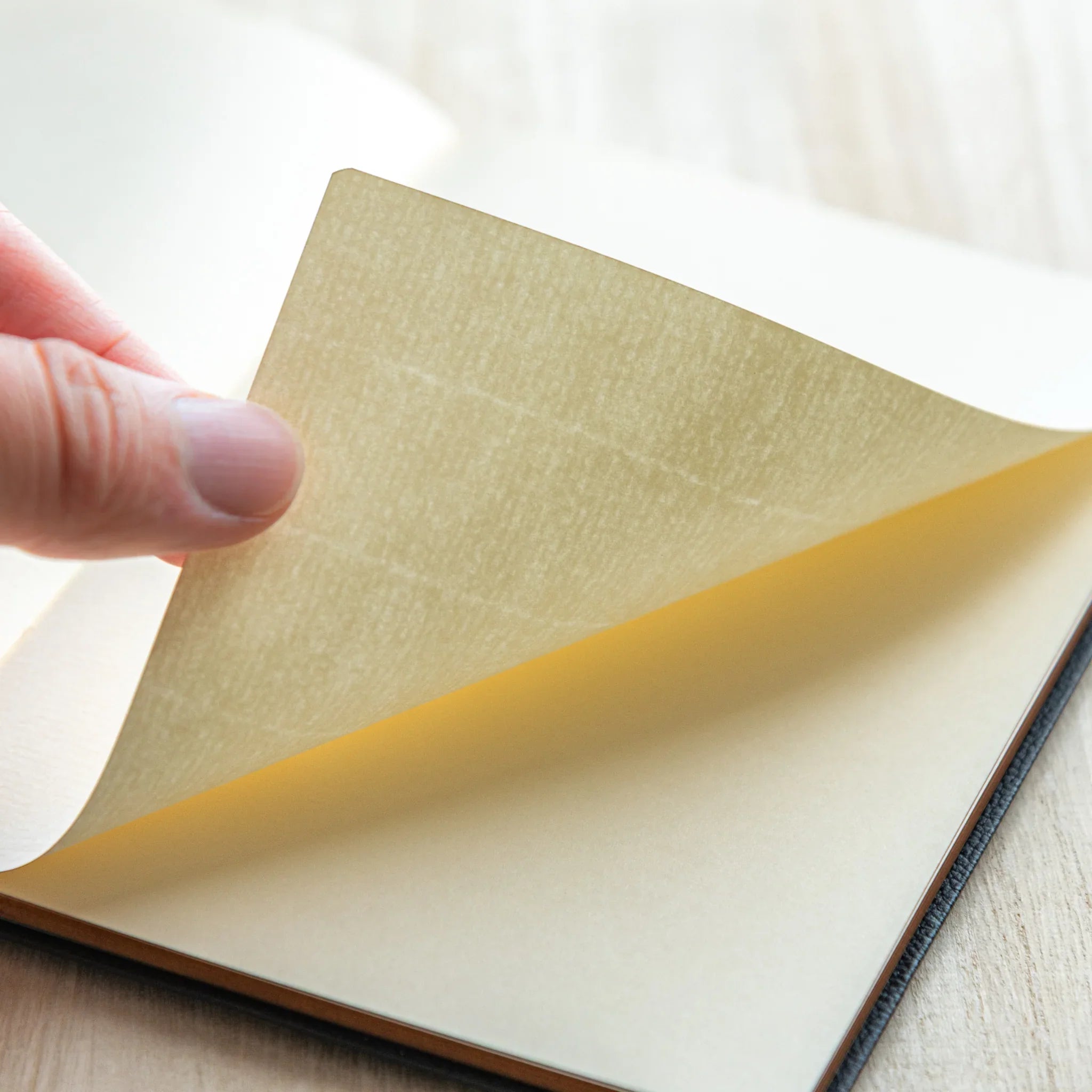 Close-up of smooth cream paper texture inside LIFE Japanese Schedule Book 2026.