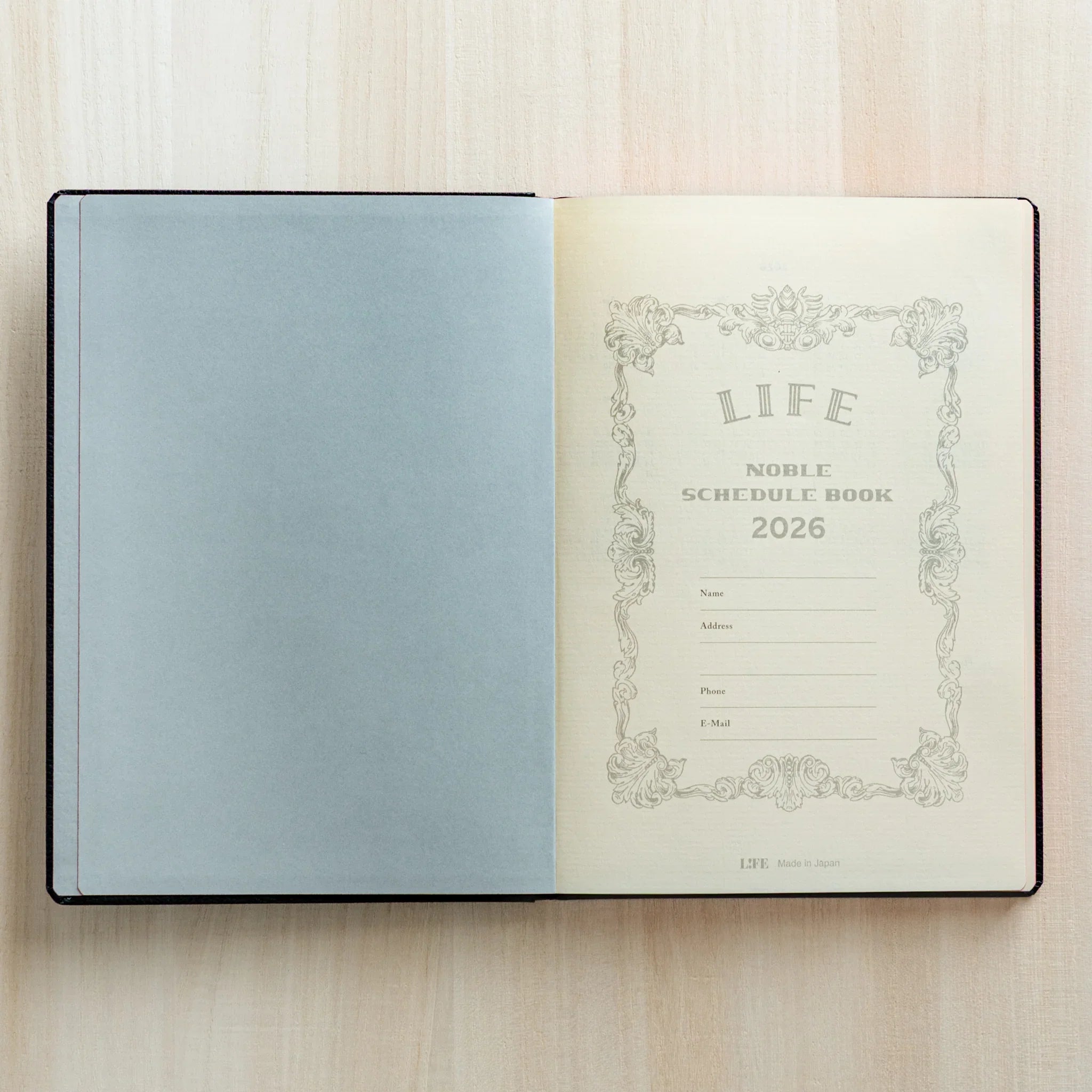 Inside view of Life Noble Planner 2026 Japanese Planner showing title page with vintage frame.