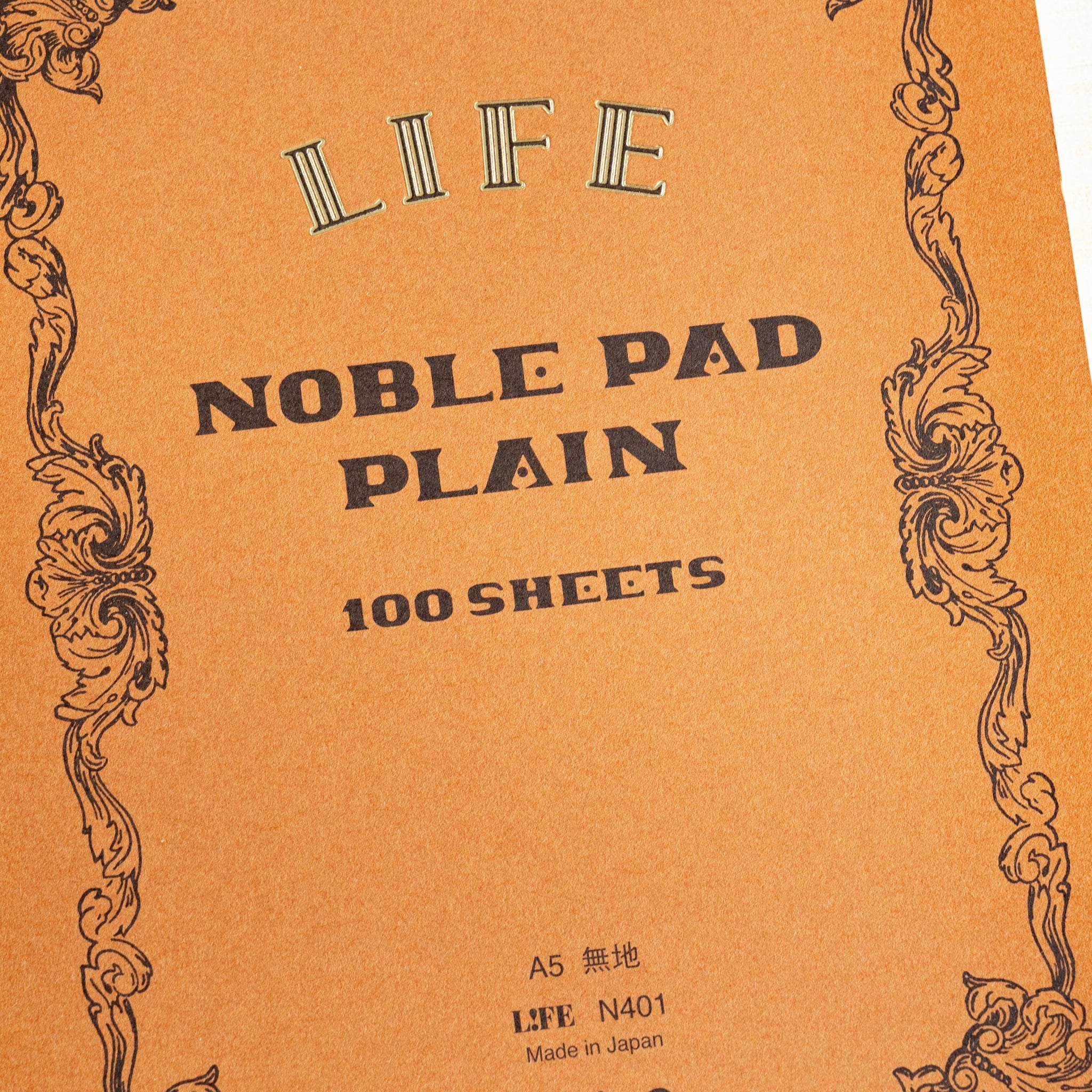 Life Noble writing pad front cover shown flat, plain Noble Pad design with vintage frame, A5 Japanese stationery pad