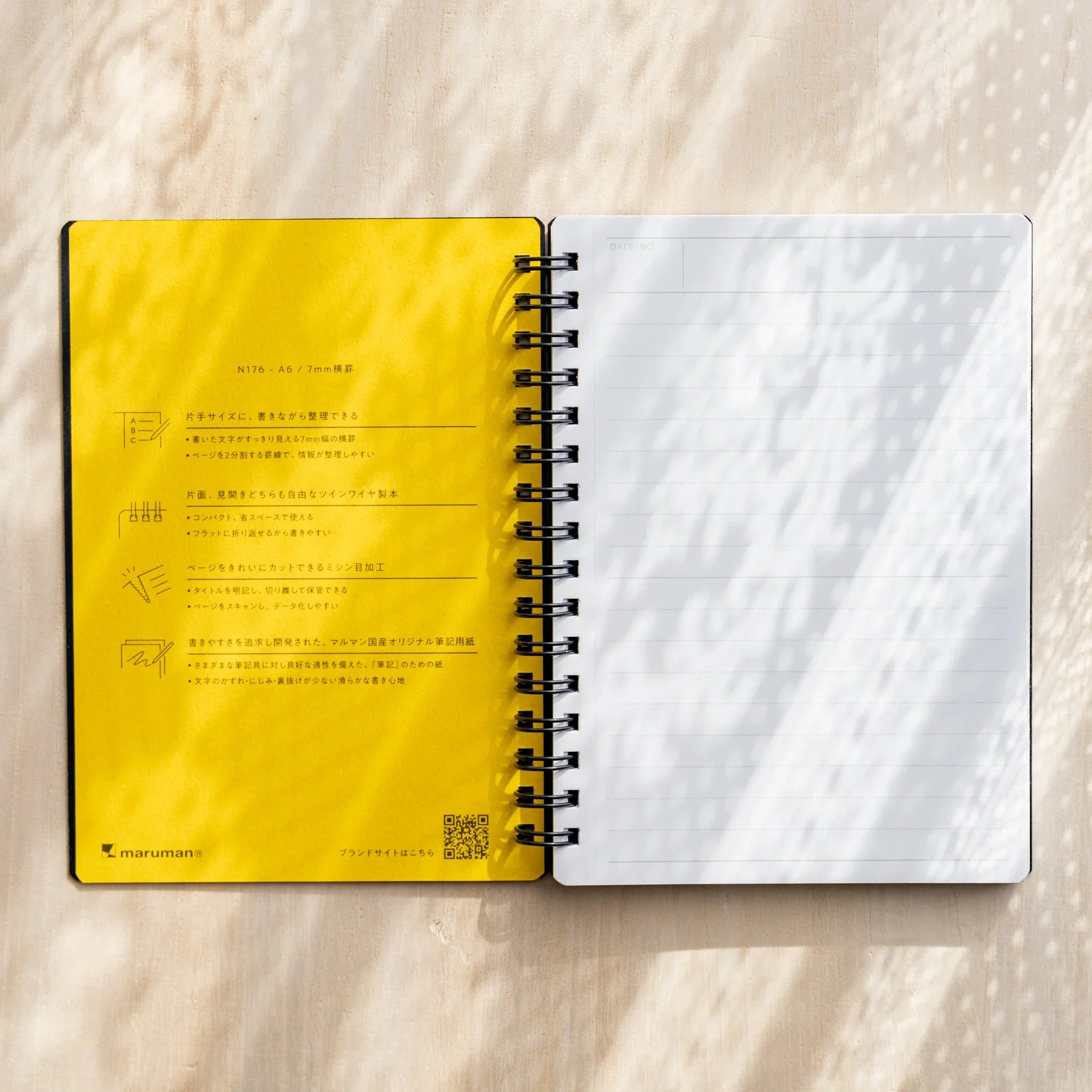 Maruman Mnemosyne notebook, cover flat lay showing minimalist front design, Mnemosyne Maruman Japan A4 or A5 notepad with