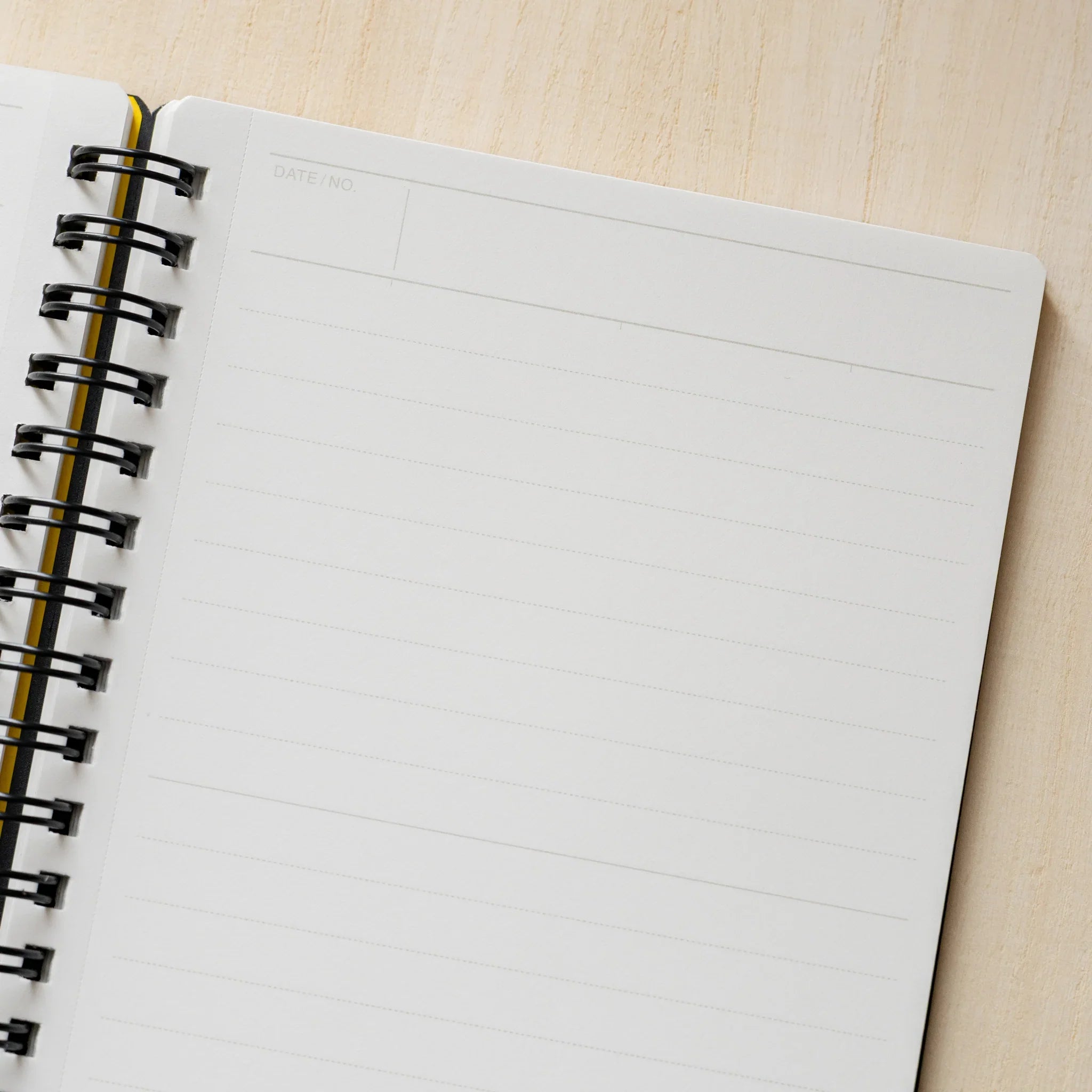 Maruman Mnemosyne notebook, opened pages showing 7mm line spacing detail, Maruman Mnemosyne Japanese notebook with smooth