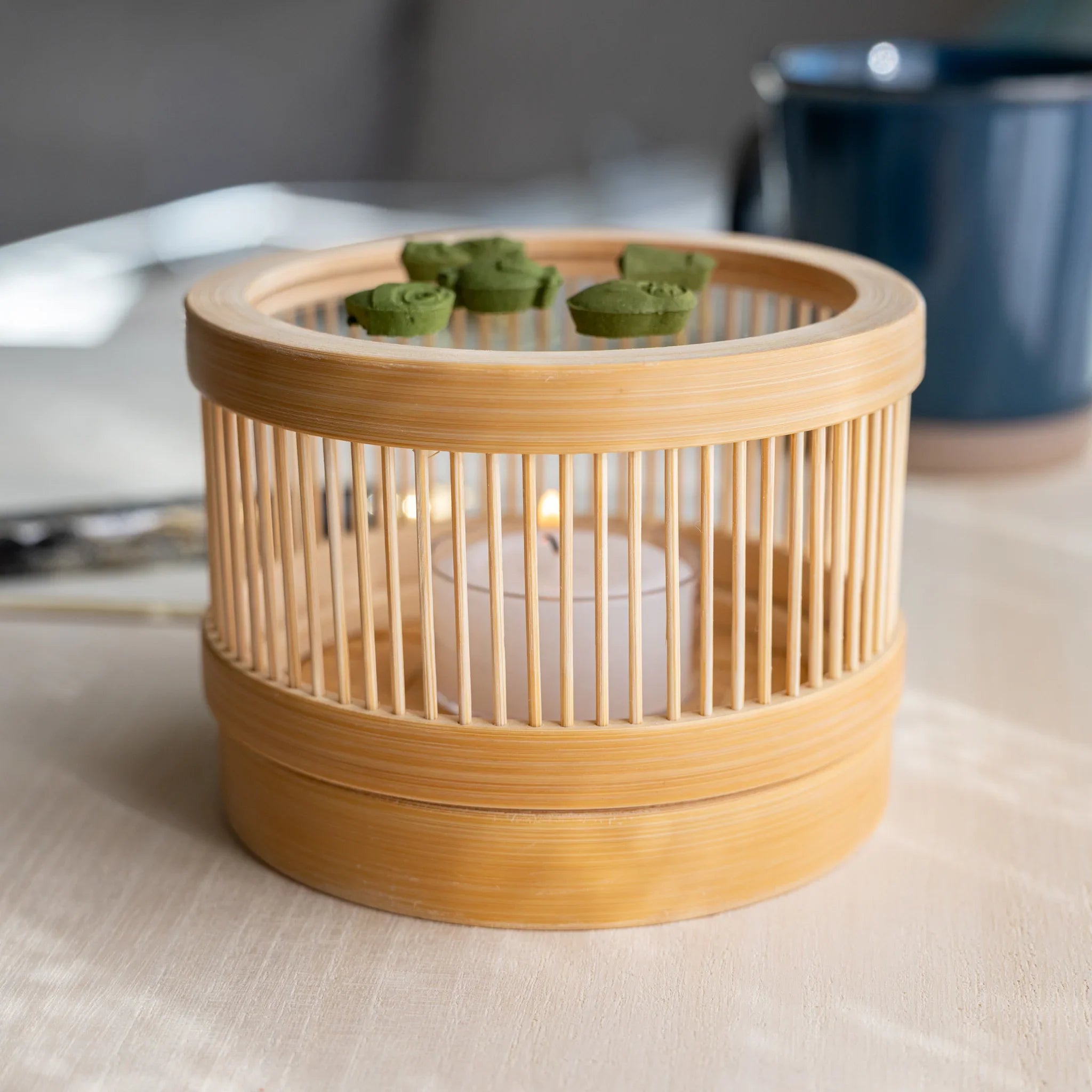 Suruga bamboo matcha incense tea warmer with three pressed matcha pieces on the heat-resistant glass plate