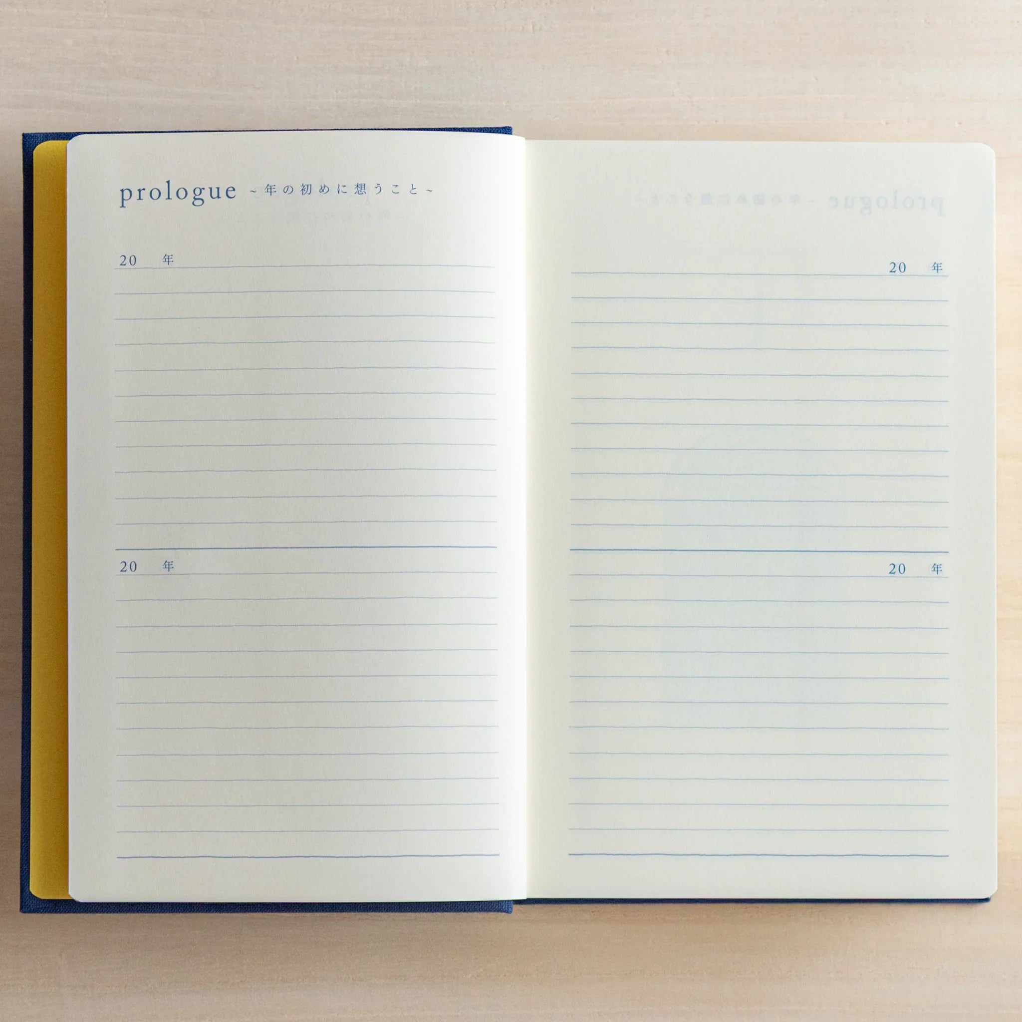 Open Midori Japanese journal 10-year diary gate design with two blank prologue lined pages and year headings.