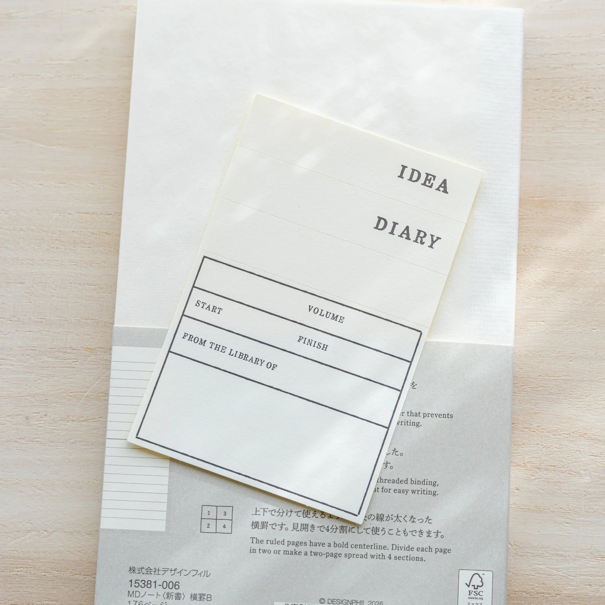 Midori MD Notebook B6 Slim Lined title page with IDEA DIARY header and fill-in fields, back cover with product info visible