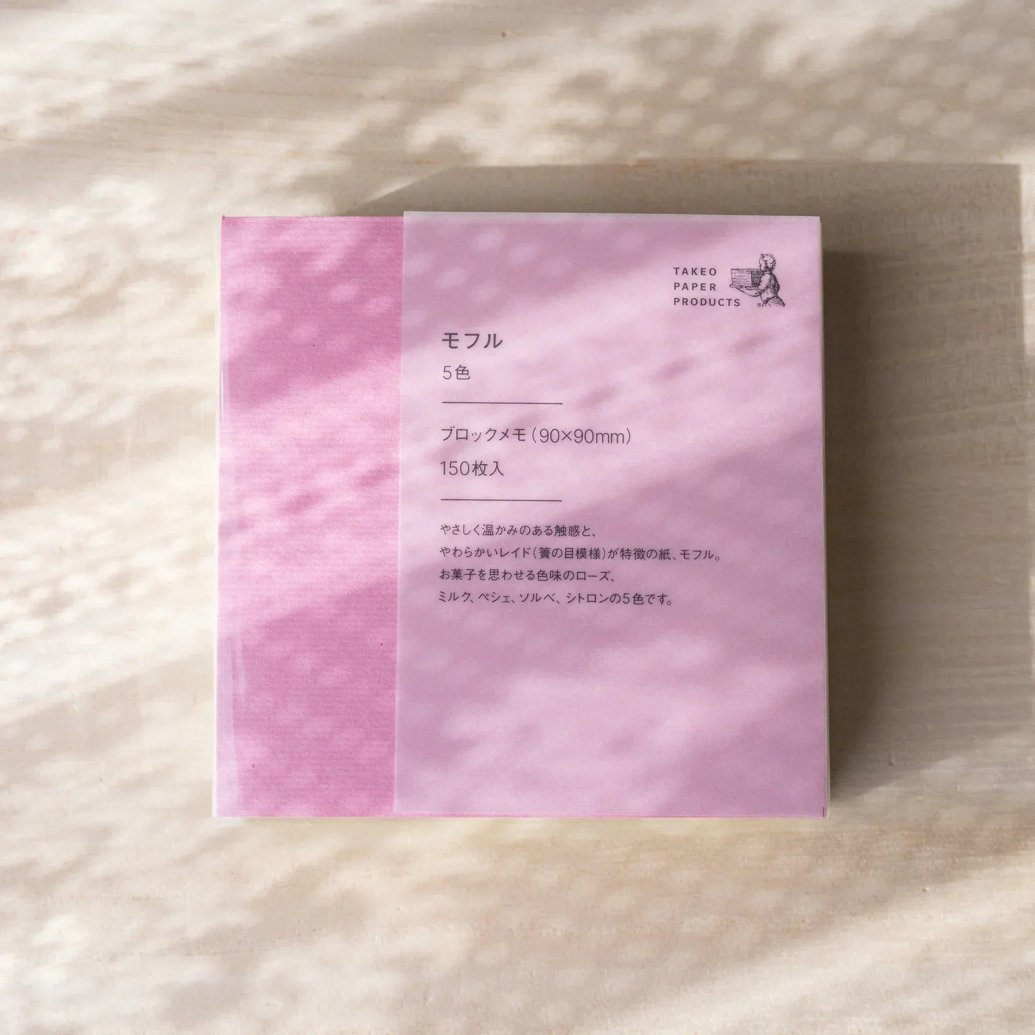 Moful memo pad in pink with cover showing Takeo Paper Products logo and product details in Japanese