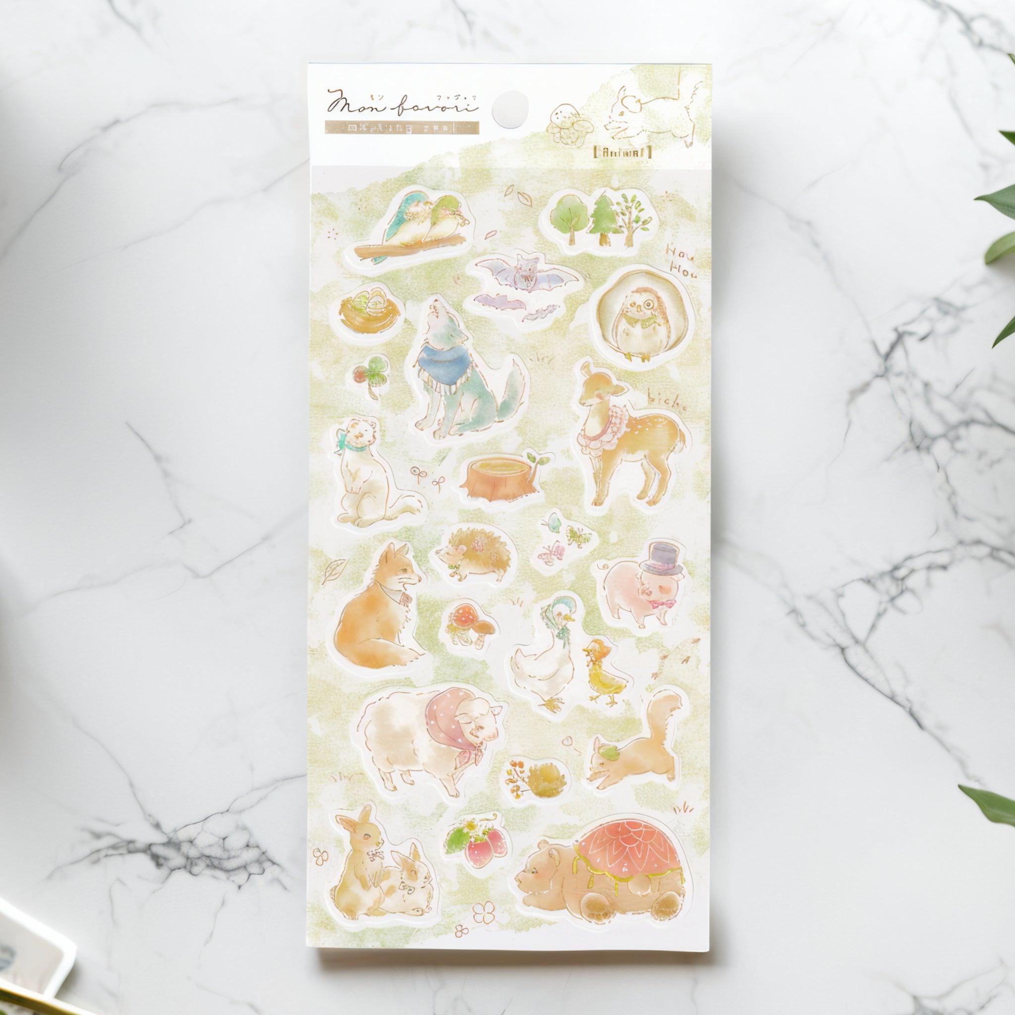 A Japanese stationery washi sticker sheet featuring adorable watercolor-style animals, including a wolf, deer, rabbit, hedgehog, and pig, in a soft nature-inspired design.