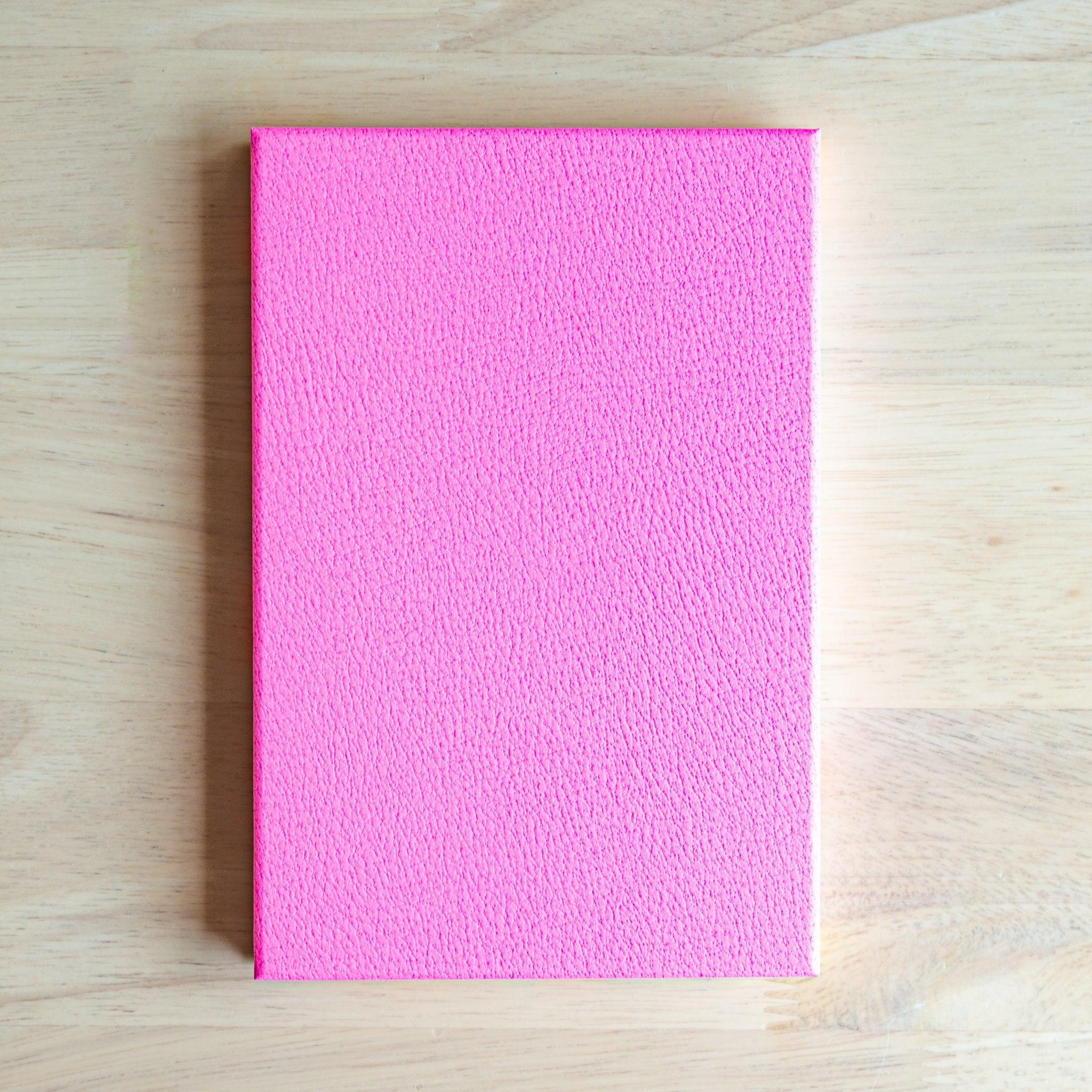 Back cover of Goshuincho stamp book in vivid pink texture, ideal Japanese stationery item for temple stamp collectors.