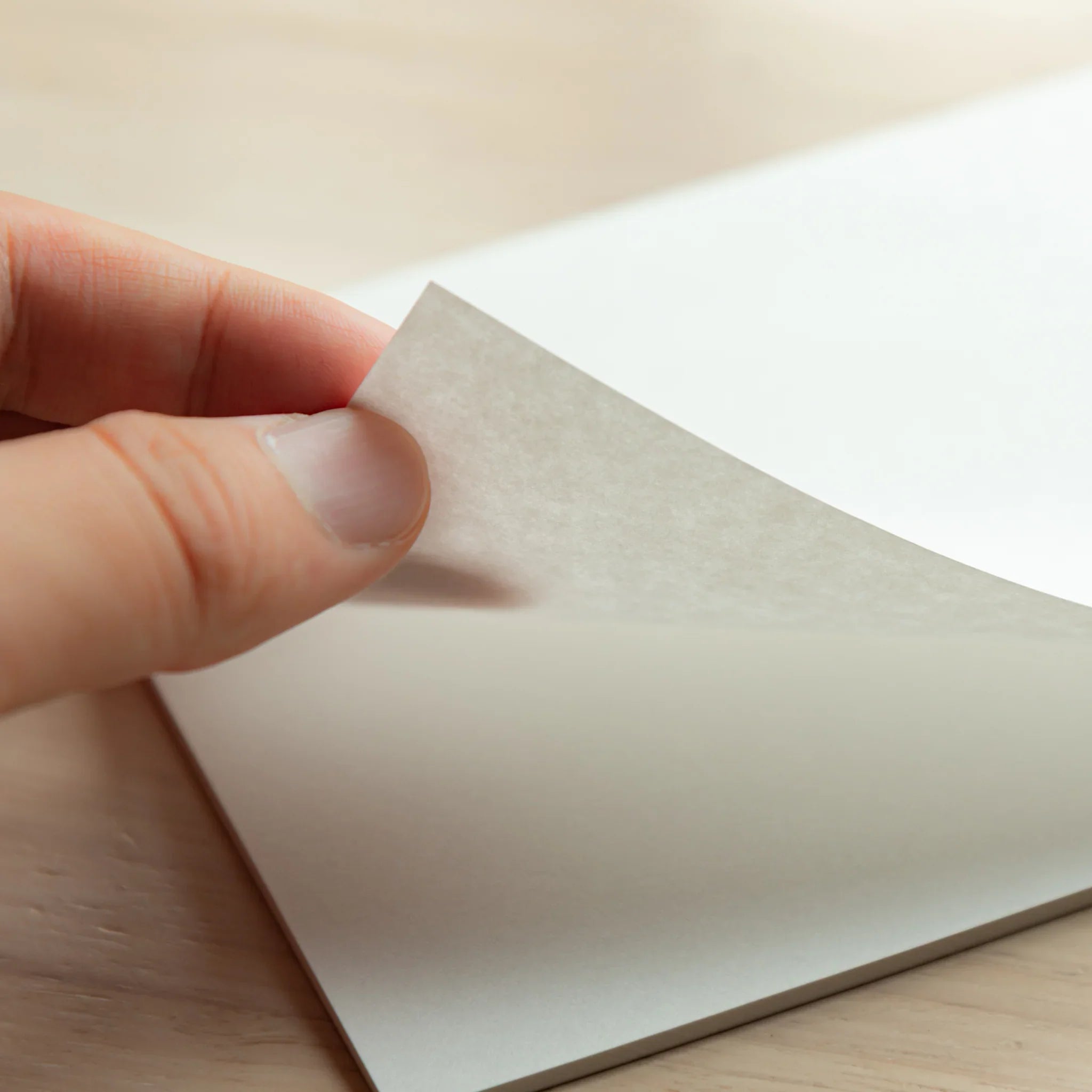 Turning a sheet from Paper Tasting Writing Pad Set Silky Vol.3 with Japanese Note Book papers by Yamamoto Paper. 