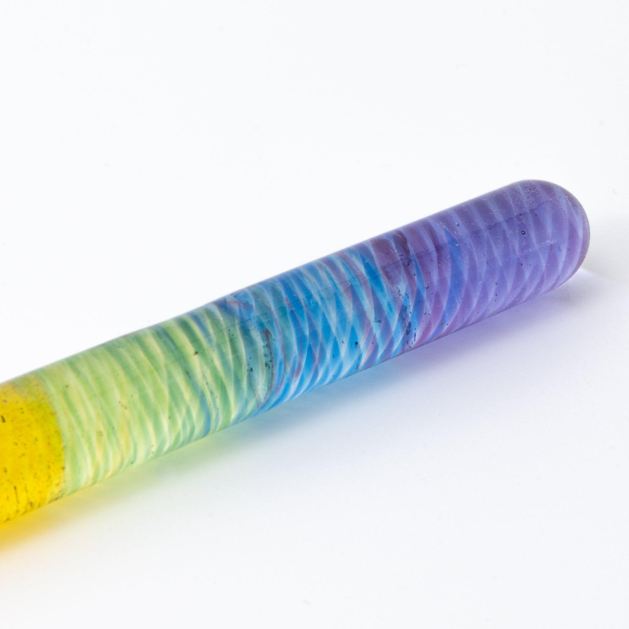 Short glass dip pen with vibrant rainbow colors and a spiral design, perfect for Japanese stationery enthusiasts, displayed on a clean white background.