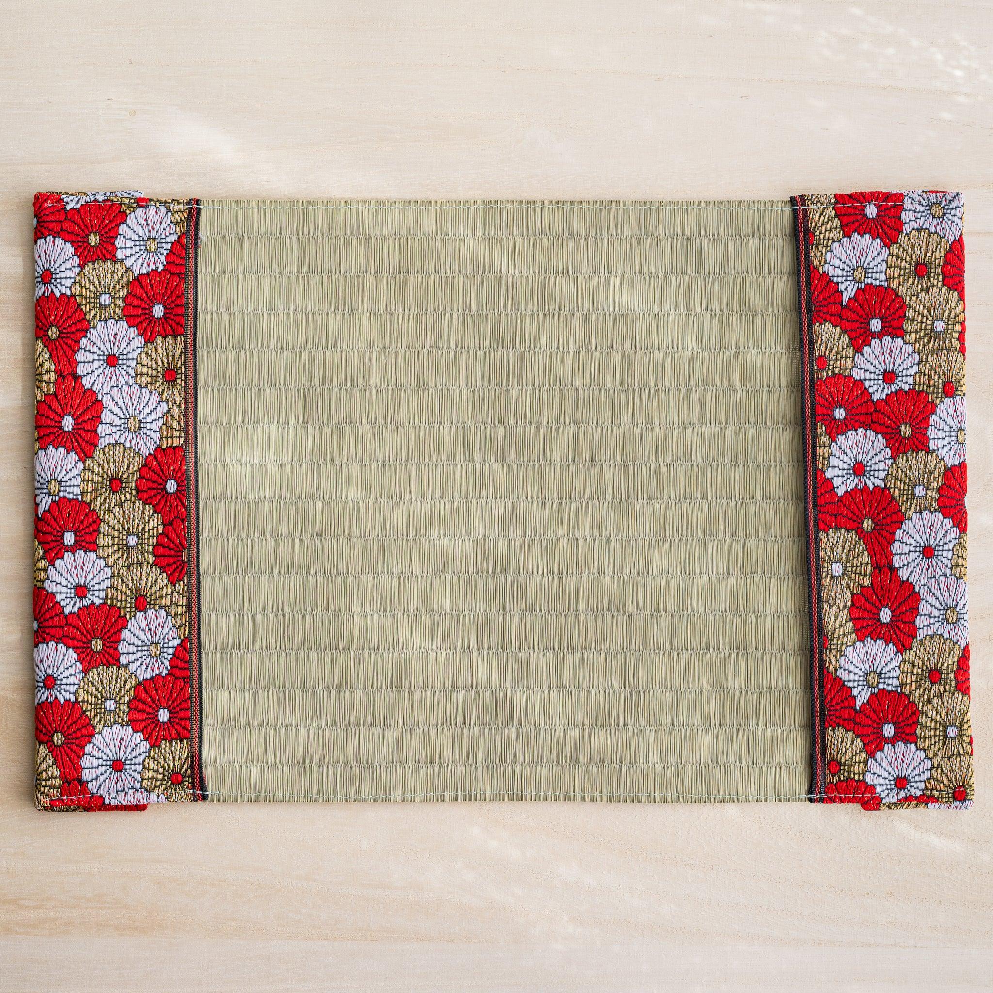 Tatami book cover unfolded flat, inner side up, rush straw center with chrysanthemum flaps and dark striped trim